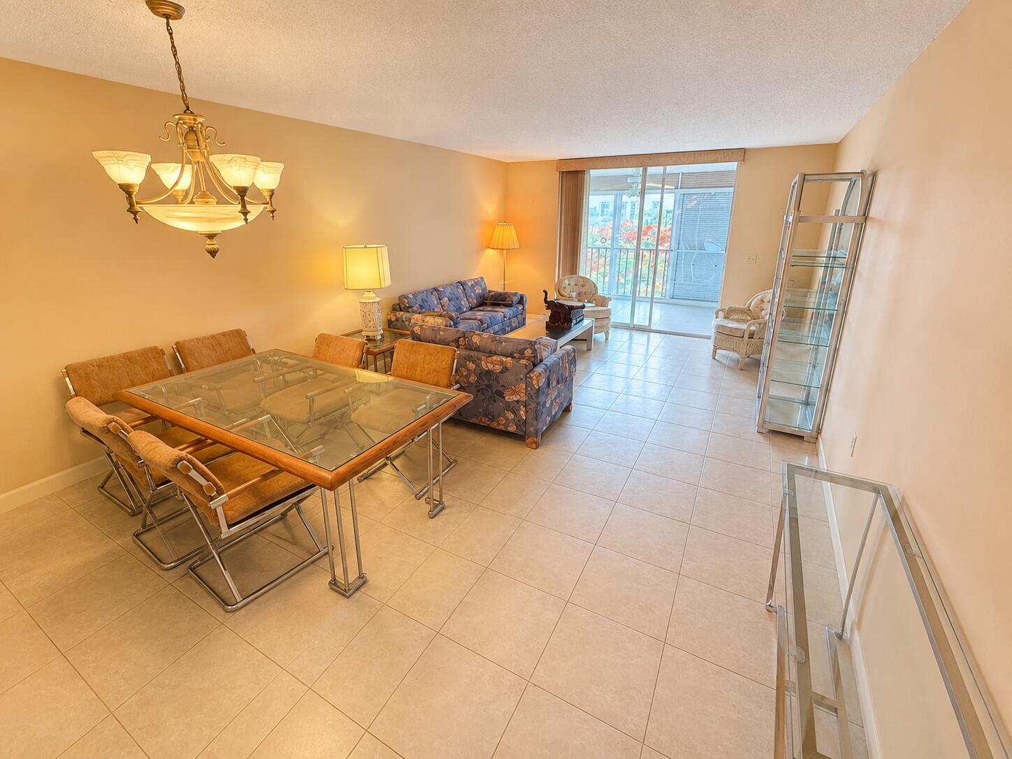 Enjoy penthouse living in the desirable gated section of Deauville. This spacious 2 bedroom, 2 bath condominium features an oversized balcony, providing the perfect space to relax and enjoy the Florida lifestyle. Residents enjoy access to an exceptional, recently renovated clubhouse featuring resort-style amenities, including a beautiful pool and spa, fitness center, library, game room, and a variety of social activities. The community also offers the convenience of onsite management. Ideally located close to shopping, dining, entertainment, and major roadways, this property presents an excellent opportunity to customize and make it your own while enjoying all the benefits of an active, amenity-rich community.