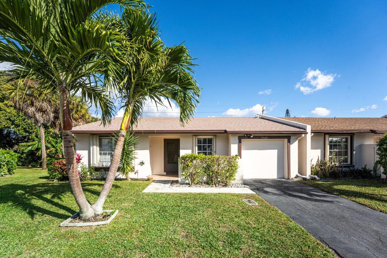 JUST WHAT YOU HAVE BEEN LOOKING FOR. RE-ROOFED 2025 PERMIT COMPLETE.END UNIT,GARAGE,UPGRADES THROUGHTOUT,CLUBHOUSE, 24 HR MANNED GATE. . Well cared for villa features  foyer entry,fully upgraded kitchen(2017)  built-in microwave,& oven,smooth top range ,granite counters. Custom drapery. Easy care bamboo hardwood flooring in the living area & primary bedroom. Foyer, kitchen & 2nd bedroom have tile flooring. primary bth has a shower, 2nd BTH has tub-shower combination. Sliders from the living area lead to a secluded screened patio. Easy access attic with pull down stairs. A/C handler motor replaced 2023. Condensing coils replaced 2024. Pedestrian garage door replaced 2023. , See More HOA dues include cable, manned gate,exterior painting, pest control,Lawn care, cable. Join in a game of tennis, shuffle board, basket ball, hand ball. Get fit in the gym. Go for a swim in the pool. Las Verdes POA $175.00 monthly. $290.00 per Quarter Bottlebrush POA Pets: No dogs, cats and birds okay. Rental restrictions: Can rent immediately 3 months minimum up to one year.