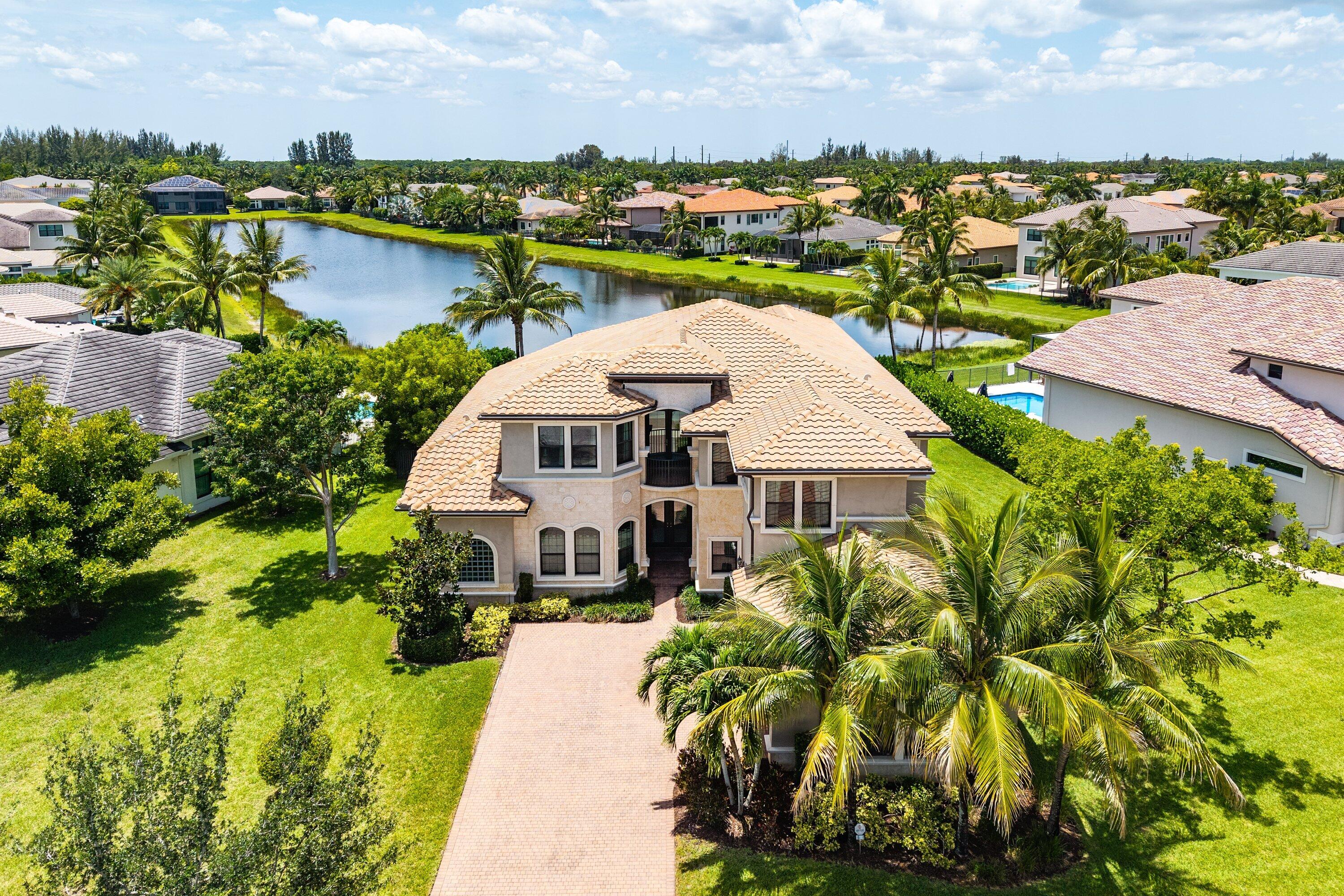 Beautifully upgraded 5-bedroom Colonnade residence set on an expansive property with breathtaking long lake views in Seven Bridges. Every room enjoys either serene water views or lush, private landscaping, with no front neighbors. The thoughtfully designed floor plan features a luxurious first-floor primary suite, guest bedroom, and private office, while the second level offers a spacious loft and three oversized bedrooms, each with its own en suite bathroom. Additional highlights include a heated pool, custom closets throughout, and a 3-car garage with epoxy floors. Luxury living is redefined at Seven Bridges where residents have access to world class amenities including a gourmet restaurant, 3 pools, elite tennis program, pickleball and fitness classes.