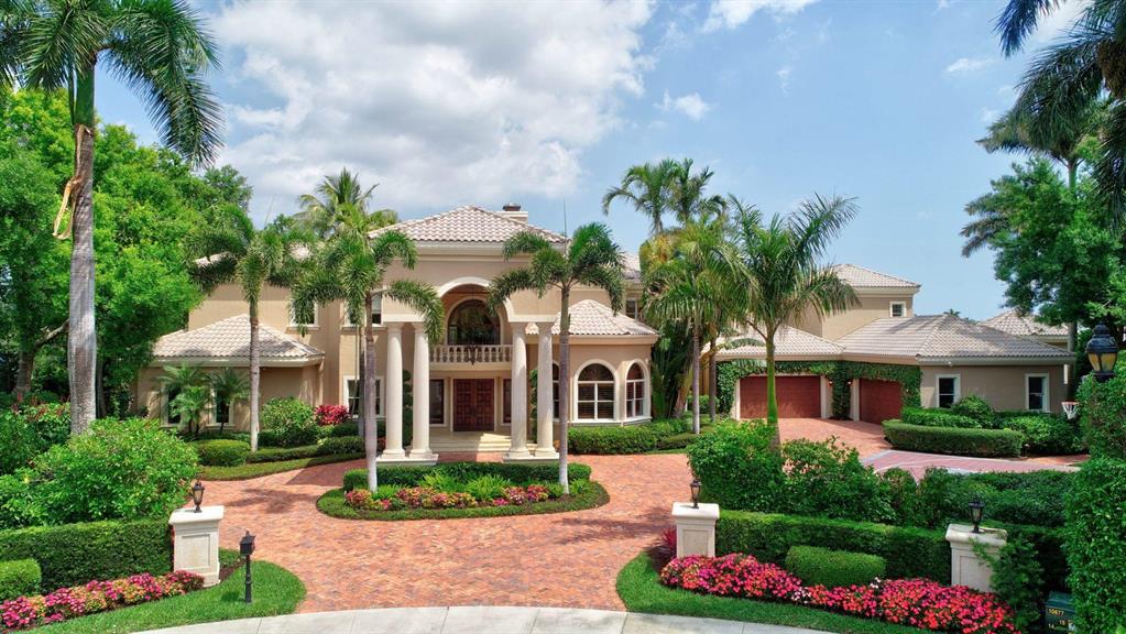 Spectacular home in the exclusive Princeton Estates subdivision with expansive lake and golf views. Beautiful center staircase welcomes you into this two-story, one-of-a-kind estate home built for entertaining. This home features two media rooms, two offices with built-ins, and an excess of space for hosting.
6 beautiful arched doors lead you to the backyard, from the expansive living room off of the kitchen. Adorned with a gas fireplace, gorgeous views, and two designated sitting areas, this room is perfect for enjoying the indoor/outdoor Florida lifestyle.
The gourmet kitchen is decorated with an oversized island, two sinks, a gas stove with a pot filler, double ovens, and an in-island microwave. 

Read more... The downstairs entertainment suite enjoys two sitting rooms, a private patio, and two large walk-in closets. This space is perfect for movie nights.
Outside you can find paradise between an excess of entertainment space and a resort-style, heated pool and spa. Adjacent to the swimming pool is a tiki hut, decked out with a complete summer kitchen (refrigerator, ice maker, sink and bar), a television, and a storage closet. The home also enjoys an outdoor living room, a second summer kitchen with barbecue and refrigerator, a wrap around patio, and amazing views.
Downstairs, the master suite is adorned with hardwood, a private home gym/sitting area, and a view and entry to the pool and tiki hut. The master bathroom has two showers, a steam room, vanity, jacuzzi tub, water closet, and oversized walk-in closets with built-ins and an island.
Upstairs features an entirely hardwood wrap around loft that frames the great room, media room with half bath, a sitting room, and five bedrooms. Each bedroom has its own walk-in closet and an ensuite bath (one of which is Jack-and-Jill between two bedrooms). Four of the bedrooms upstairs and the media room enjoy incredibly spacious balconies overlooking the backyard and lake.
