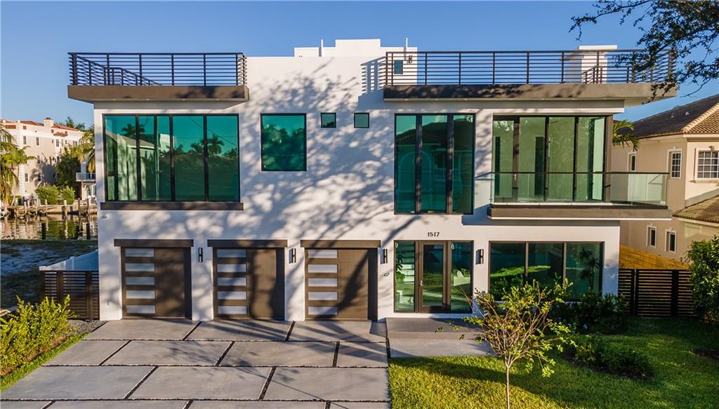 Gorgeous Contemporary New Construction in Lauderdale Harbours.   This 3 story residence has it all -Location, Views, Lifestyle.  Fabulous Living, Dining, and Bar space allows for perfect entertaining. Chef's kitchen with Wolf appliances, Miele built in coffee maker- Two Master Suites plus two secondary suites.  A third floor party deck with views of downtown,  Ft Lauderdale beach area,  and cruise ships.  70' of waterfront with no fixed bridges.  Minutes to the ocean for snorkeling and diving or just cruise around the beautiful intercoastal waterway.