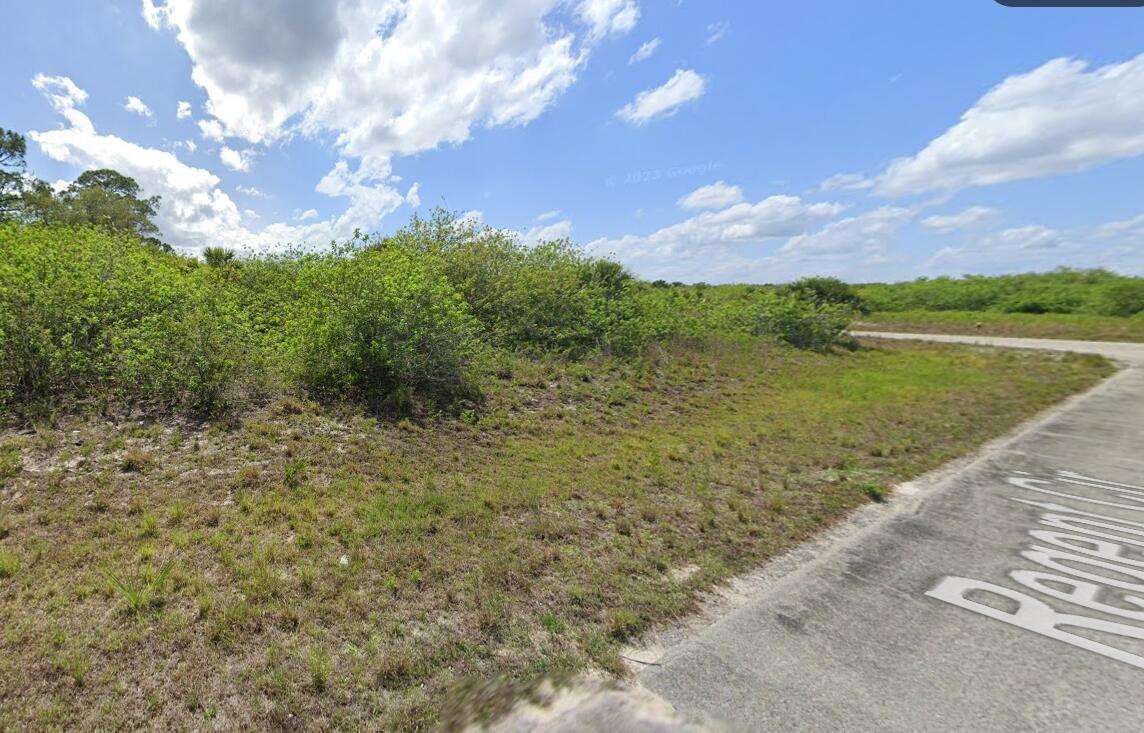 Beautiful Corner Oversize 0.30-acre residential lot located in the desirable community. This spacious corner property offers plenty of room for a custom home, pool, or additional outdoor features. Situated on a quiet street with established homes nearby, the lot provides a peaceful setting. High speed optic fiber internet featured in this community. The property is zoned RG3 residential, making it ideal for a primary residence or long-term investment. Port LaBelle is known for its natural surroundings, wide open spaces, and easy access to SR-80. Whether you're looking to build now or hold for future development, this lot offers excellent potential at an affordable price. Don't miss this opportunity to secure your land