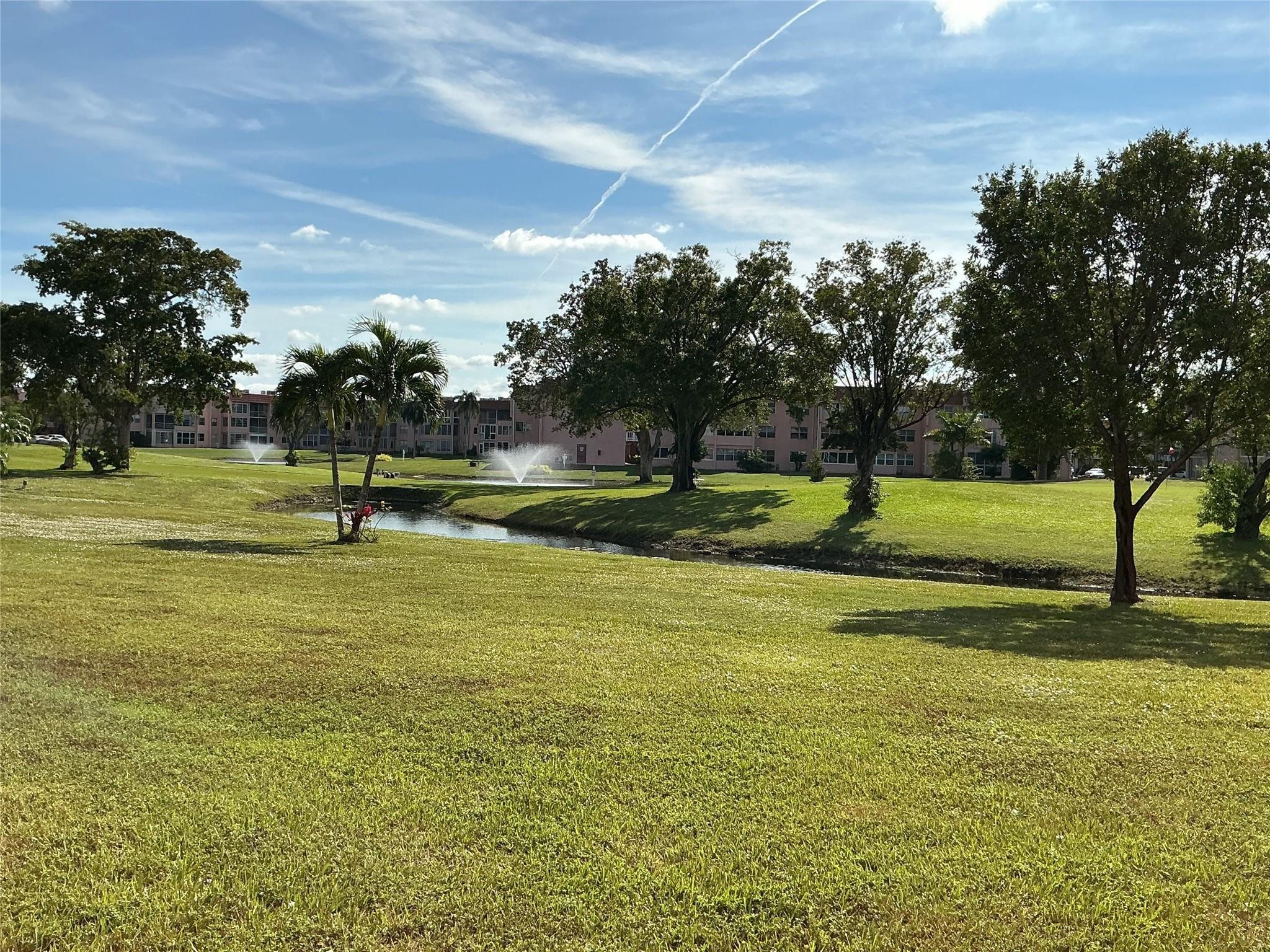 SELLER VERY MOTIVATED ALL OFFERS WILL BE CONSIDERED exceptional value & endless potential in this first floor condo overlooking serene water views &beautifully maintained 9-hole golf course adult community offers a vibrant resort style livingRenovated kitchen 2022 white wood cabinets, smooth top range, refrigerator no ice maker, dishwasher, pantry &eat-in area Renovated primary bath 2022 with designer tile in shower This condo is perfect for buyers looking to customize a space in a community that offers unmatched amenities  Tennis, pickelball,fitness center, on site theatre with live entertainment, social activities & clubs Assn says 55+ credit score min 670 income 3000/mo 10% down if cash, 20% down financing 6 mos maintenance fee in escrow for 3 mos No rentals Freshly painted int-a/c 2023