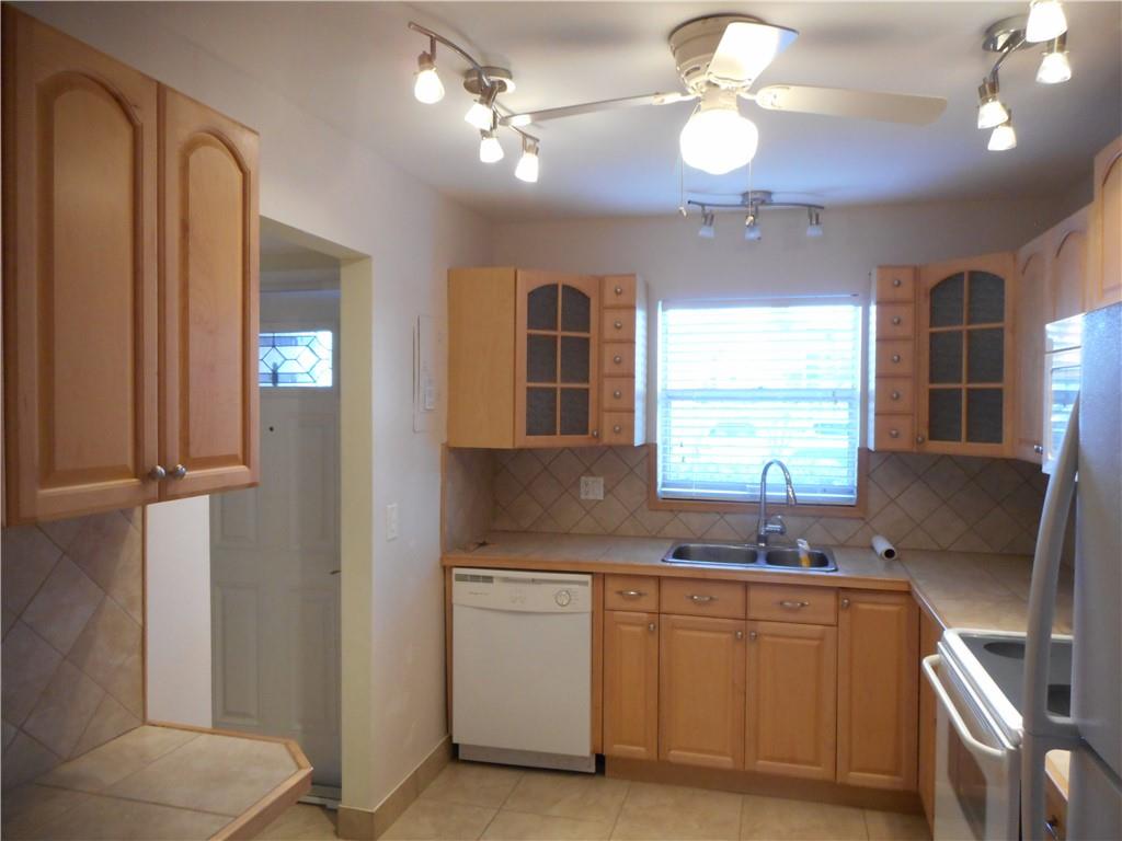 Centrally located condo, quiet 55+ community. Move in ready. Responsibly managed. New roof just completed. Desirable first floor entry with parking space right out front door. Close to mail box and laundry room, additional storage on back porch utility closet and in extra storage rooms. 5 minutes to 5 grocery stores,10 minutes to beautiful Deerfield Beach.