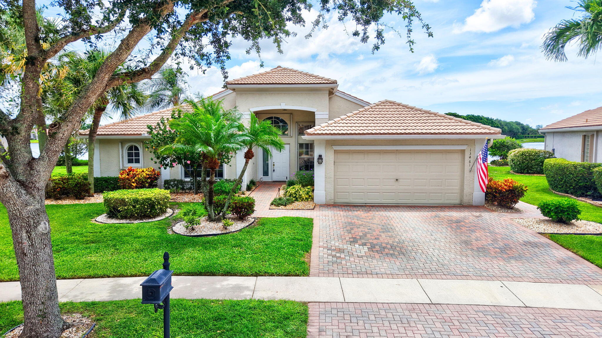 This is a SPECTACULAR POINT LOT with a pool/spa, whole house generator & accordion shutters overlooking the big lake.  This is one of the best premium lots in Valencia Falls!  There are gorgeous lake views from all  entertaining areas & the primary bedroom.  This is an impeccably maintained Palma model with the third bedroom used as an office/den. Formal living room has library shelving w/ storage for many books.  Entertain in the open formal dining area.  Kitchen is open to family room w/doors leading to the covered lanai & pool/spa area.  Primary bedroom has 2 large walk-in fitted closets & large linen closet. Primary bath has dual sinks, large shower with bench seat & a separate water closet. Guest bedroom has walk-in closet & shares a Jack-N-Jill bathroom with Office/Den/3rd bedroom.   Come live the Valencia lifestyle with a newly renovated clubhouse and fitness center.  Six pickleball courts and 6 tennis courts, newly renovated and expanded cafe and fitness center.  Resort style swimming pool heated in the winter and cooled in the summer.  Other amenities include Bocce, cards, art, billiards, shows and many more activities.  All measurements and information deemed accurate and should be independently verified.  Valencia Falls is a 55+ community.