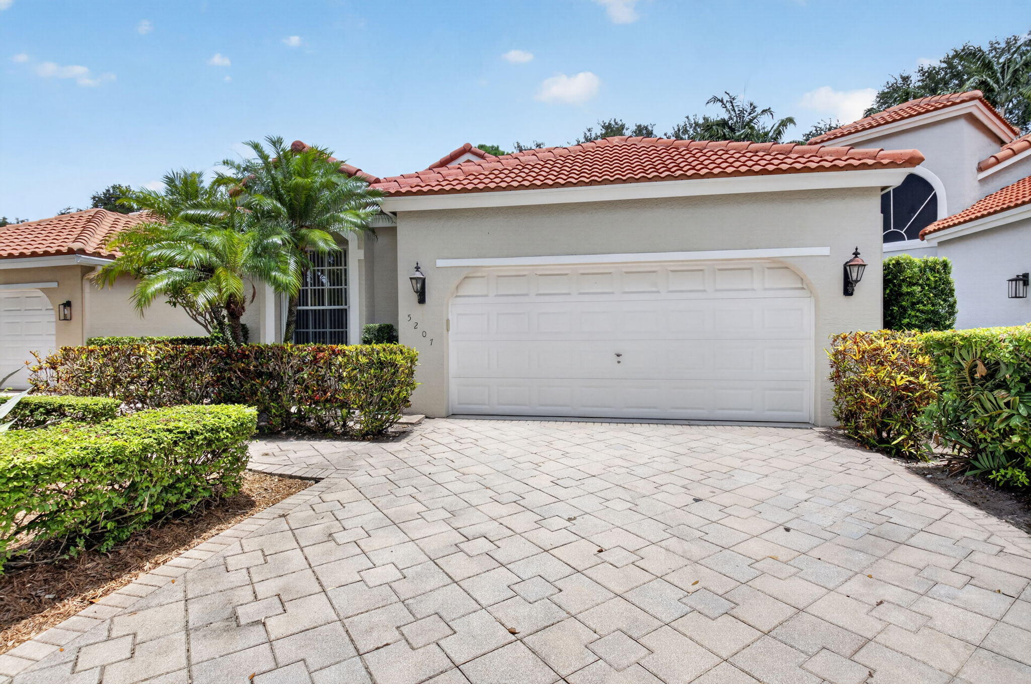 Nestled in the desirable Brookside at Indian Spring, a charming community known for its tree-lined streets and beautifully maintained homes, this move-in-ready 2 bedroom plus den offers comfort, style, and value. Recent updates include a 2019 roof, 2021 water heater, vaulted ceilings, fresh interior paint, and accordion hurricane shutters for added peace of mind. The bright kitchen and bathrooms feature crisp white cabinetry, while neutral tile flooring throughout create a clean, timeless look. Relax on the screened patio surrounded by lush tropical landscaping that provides plenty of privacy. Exterior painting has just been completed, and cable and internet are included. This well-maintained home is priced to sell, motivated seller welcomes all reasonable offers! Pool spa and social room located with in the Brookside community.  Optional Indian Springs golf & social memberships are available.