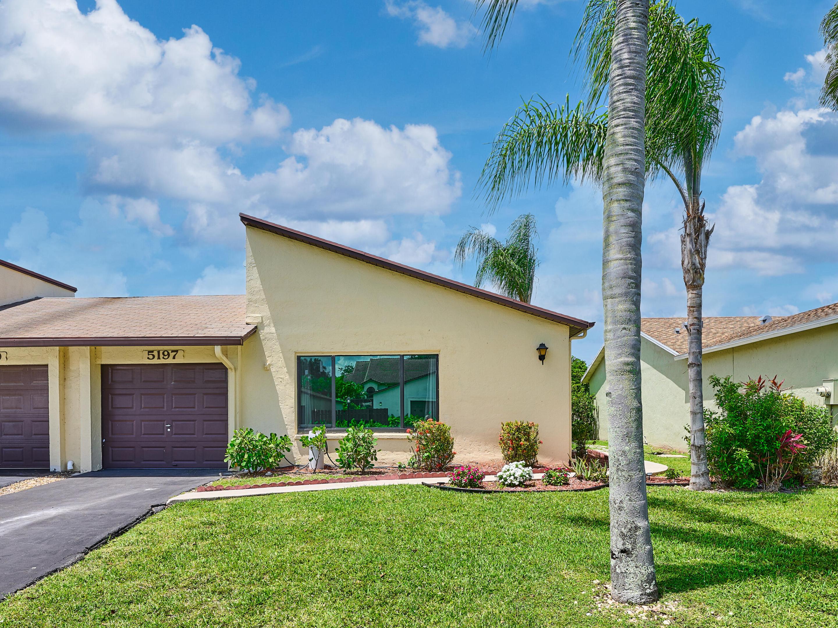 Lovely 2bd 2 bath waterfront villa located within a charming 55+ community. Open floorplan with large neutral tiles creates a light and airy feel throughout the home. Impact glass in both bedrooms give you peace of mind, while the screened in patio overlooking the canal provides you additional space to enjoy the outdoors. Kitchen counter tops are white quartz surrounded by all stainless steel appliances. Includes a 1 car garage with additional storage in the attic. Low HOA affords you a clubhouse with a heated pool overlooking the lake, tennis courts and a lovely walking path around the community. Pets are ok (dogs and cats)!! Great convenient location near tons of shopping too!  Welcome Home!!