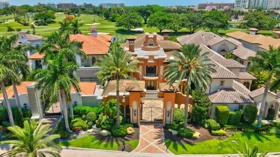 This beautiful estate in Ultra-Exclusive Mizner Lake Estates on the grounds of the prestigious Boca Raton Resort & Club,A Waldorf Astoria Resort.The home was premiered in an Architectural magazine, lushly landscaped!
This private gated enclave has 2 private manned gates, 360 security cameras down cobblestone streets.This highly coveted enclave of 15 private estates each with their own personal private gate. Entering in the private drive with the back an elongated lake, reminiscent of a moat protecting an exclusive row of exceptional castles.Beyond the back of the estates that edge the lake is the sprawling magnificent golf course & Resort Subzero,Wolf appliances,Wine room Theater.Infinity Heated Pool with Waterfall. 3 Fountains,Elevator,New SONOS,Full Impact,Full Generator & so much more NEW LIST OF IMPROVEMENTS 
Elevator completely overhauled serviced Fully up to code
New Security system and cameras
New interactive thermostats which can be operated by I Phone
New 2 Air Conditioners 
New Fountain motors 
New auto fill installed for pool, pool drained scrubbed & cleaned
New garage door motors 
New courtyard lighting installed ,plantings, sod, flowers 
New Sprinklers system installed , and New Sprinkler timer installed 
New Sonos system ,New projector system for theater
New 2 Dishwashers
Direct TV Dish with New underground cable installed
New section of Roof Over garage & front
Marble floors filled & polished
New 2  Cartridges water filters installed in kitchen