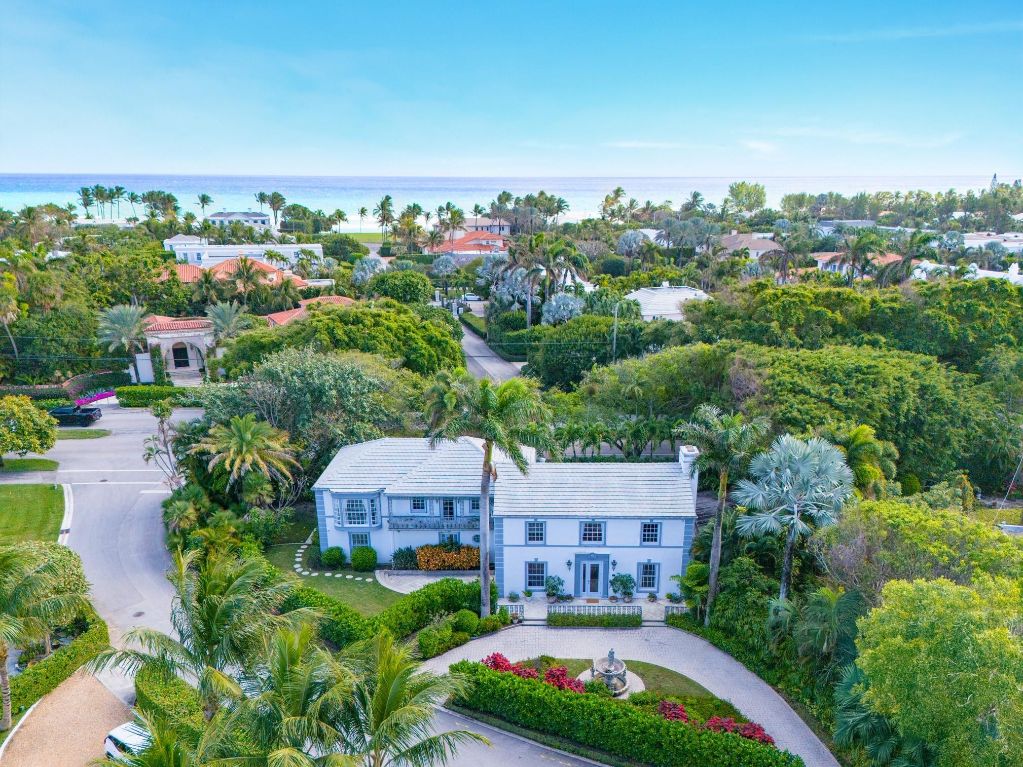 Located 1 block from Palm Beach’s pristine sands & scenic Lake Trail. The 1947 Colonial-style home renovated in 2014 w/Hollywood Regency flair features a formal foyer, wood staircase, living room w fireplace, formal dining room, original plaster moldings, library w/ wood ceilings open to garden & pool, a gourmet kitchen equipped w/custom cabinetry, Wolf gas range, Sub-Zero fridge & butler's pantry for easy indoor-outdoor entertaining, a principal suite w/ a luxurious bathroom & walk-in closet. Enjoy breathtaking views of Emerald Lane & stunning sunsets through the windows overlooking the large balcony w/ original cast railing. Stroll to the renowned Royal Poinciana Plaza trendy shops & restaurants. Don't miss your chance to experience ultimate Palm Beach lifestyle in this unique home!