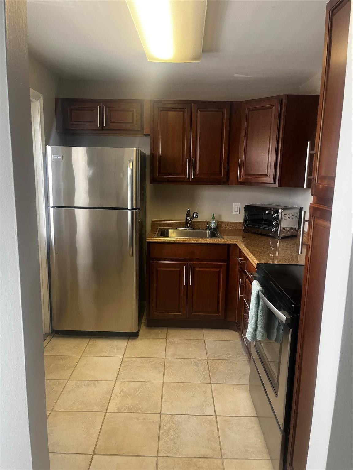 55+ Active community. NEW 2026 A/C 40 Year Inspection completed.  Low condo fees $425.00. ASSESSMENT PAID IN FULL.This move-in ready 1-bedroom, 1 bath condo in Dania Beach offers the perfect mix of style, comfort, and convenience. This condo has been freshly painted, has new carpet in primary bedroom and the view from balcony is magnificent.  Just a mile from the beach and across from the Anne Kolb Nature Center.  Enjoy resort-style amenities heated pool, fitness center, library, clubhouse, and shuffleboard. Close to Publix, Jaxon's Ice Cream, the Casino at Dania Beach, and minutes from Fort Lauderdale-Hollywood Airport. CASH ONLY MUST OWN FOR 2 YEARS BEFORE LEASING.