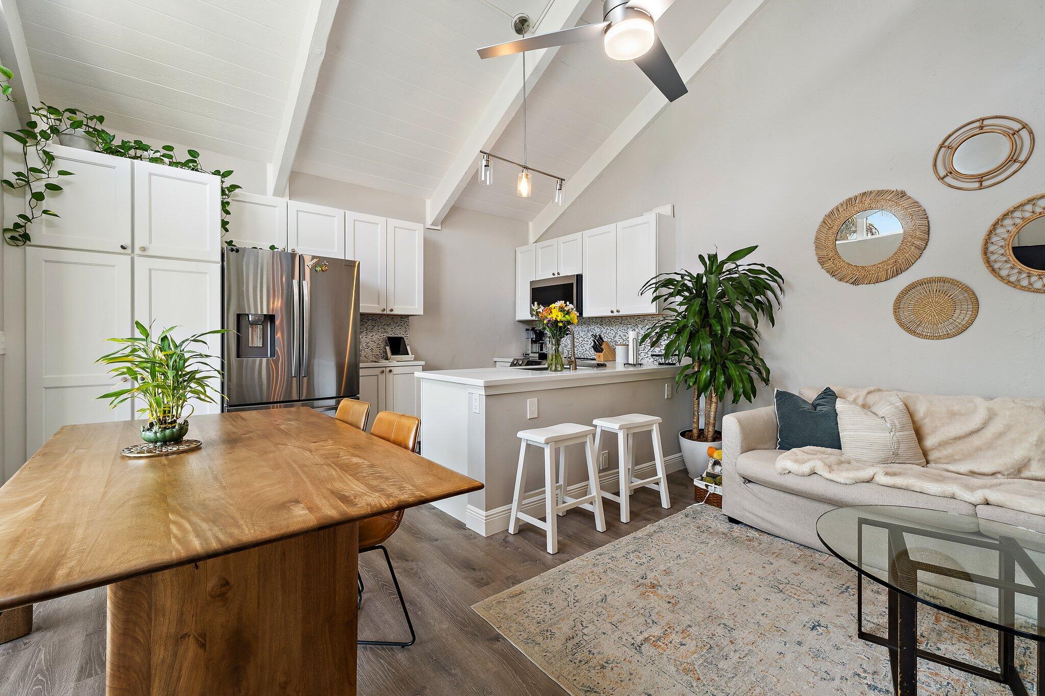 Welcome to this beautifully renovated Sealofter, ideally located in one of the area's most desirable beachside communities. Just a short walk to the beach, this light-filled residence offers a peaceful, quiet interior with impact glass throughout for comfort and peace of mind. The thoughtfully designed floor plan features a spacious king-size bed in the loft-style primary suite and a queen-size Murphy bed in second bedroom, providing flexible accommodations for guests. Enjoy outdoor living in your private courtyard and on the extended deck—perfect for relaxing or entertaining. Additional upgrades include a whole-home water filtration system and quality finishes throughout. Residents enjoy a pet-friendly community with two swimming pools and flexible rental terms, making this property an excellent primary residence, vacation home, or investment opportunity. Don't miss this exceptional opportunity to own a beautifully updated home just moments from the beach!
