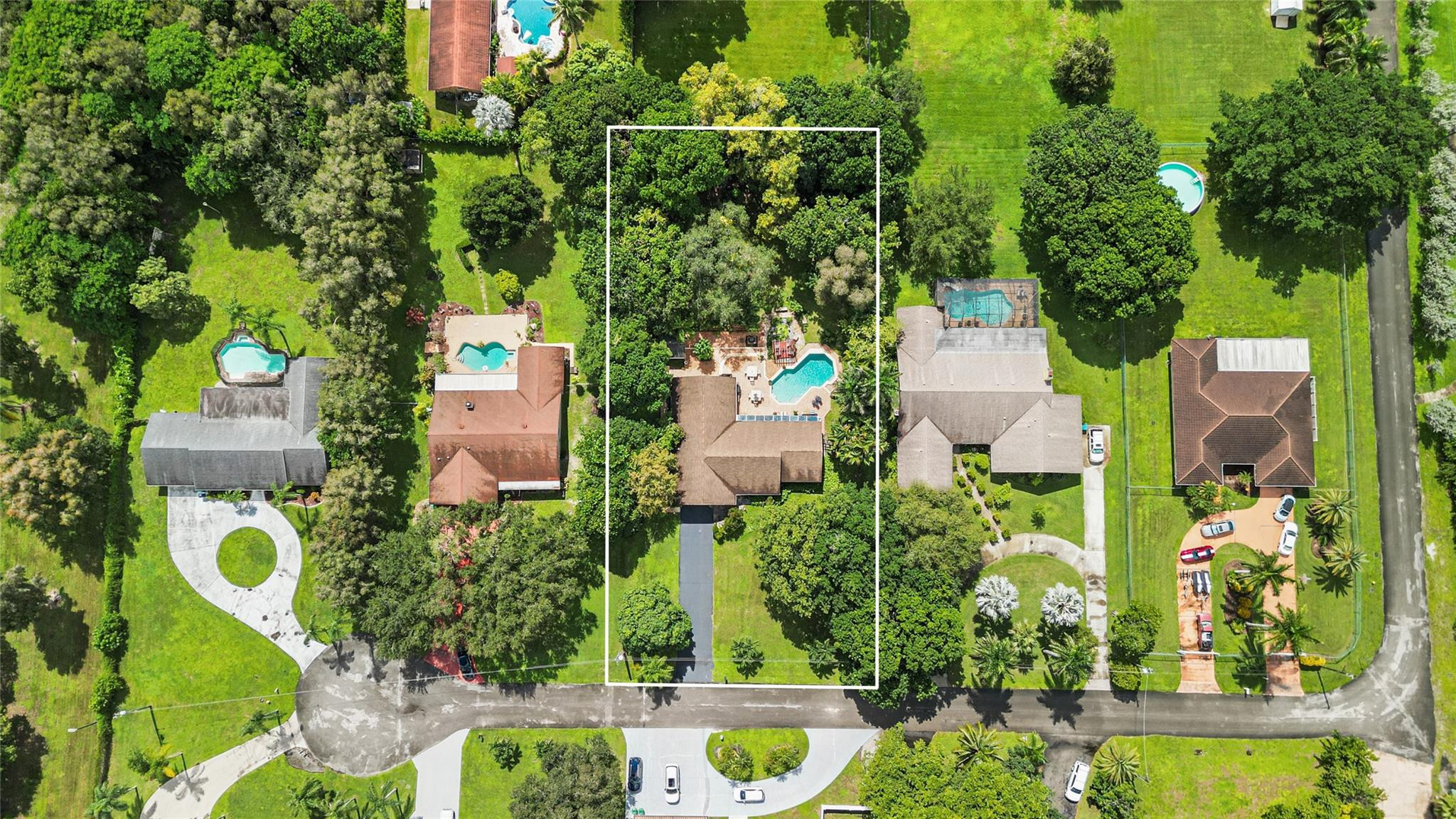 Welcome to this thoughtfully designed 4-bedroom, 2.5-bathroom residence in Lake Maranatha Estates, Cooper City, offering 2,939 square feet of finished living space on a single story. This single-family home provides comfortable accommodations with a 2-car garage for convenient storage and vehicle parking. With well-proportioned rooms that adapt to various uses and entertaining needs, this layout is optimal. Located in Cooper City with NO HOA, this property offers a solid foundation for those seeking a spacious, functional home on nearly 1-acre. Possibilities are endless with the home and space.
