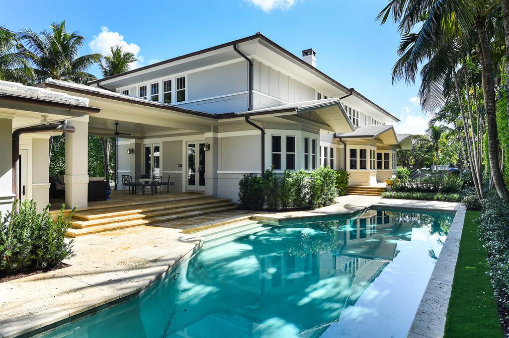 Spectacular Beach House in pristine condition, beautifully redesigned by Marc-Michaels Interior Designs. Situated on lovely In-Town Ocean Block Clarke Avenue. Gorgeous estate features 5 bedrooms and 6 and a half baths. Stunning, large Master Suite features fireplace, sitting room, and dual baths and walk-in closets. Every need is accounted for, with an elevator, full house generator, and two car garage that is conveniently accessible via service drive. Estate features fabulous entertaining areas, including oversized living room with fireplace, library with wet bar, and window-lined family room that leads to open patio and covered loggia. Chef's paradise with top-of-the-line appliances, eat-in kitchen with island, breakfast nook, and formal dining room. Guest House with living room, bedroom, and en-suite bath. Oversized 45' swimming pool and full cabana bath. **To be sold As Is. All sizes approximate and subject to errors and verification. Square Footage for main house + guest house as per County Tax Rolls.