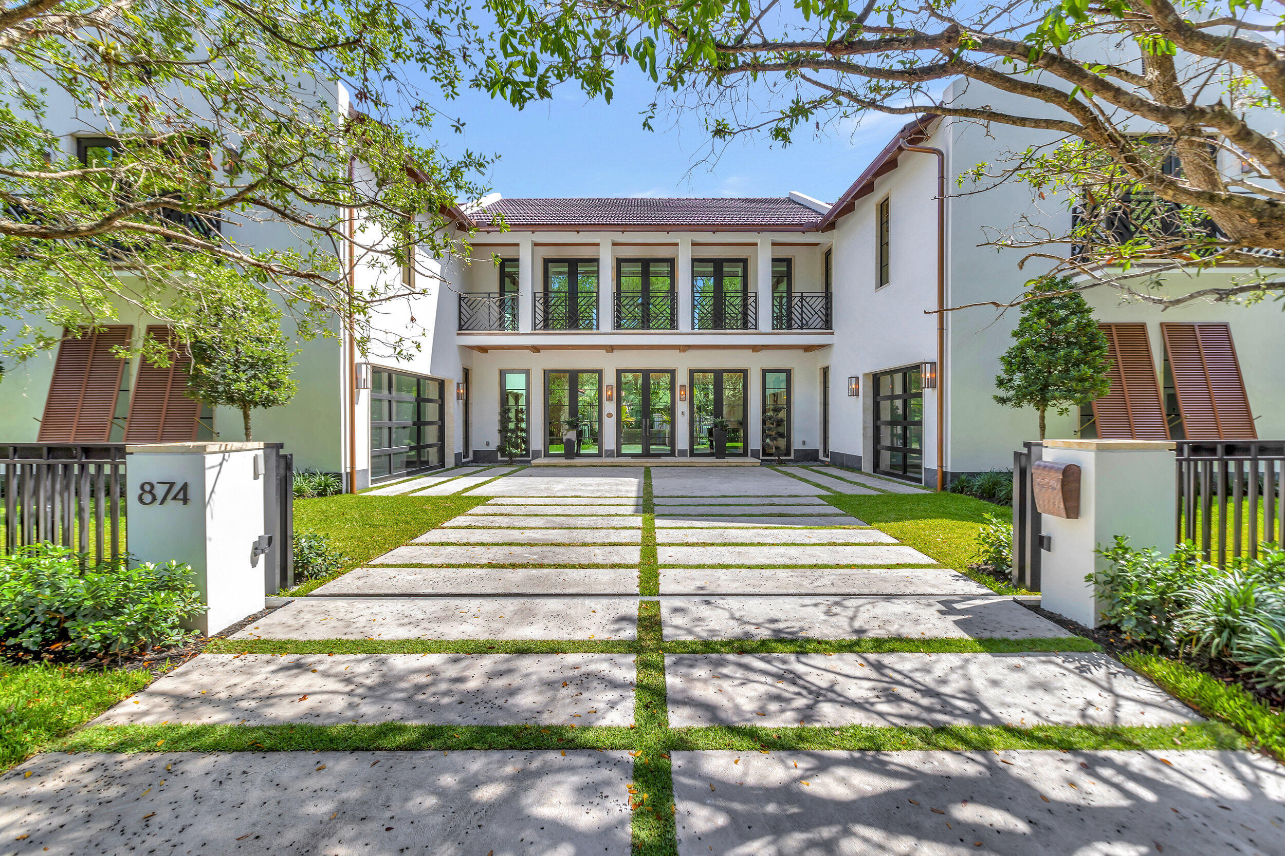 New construction gated custom modern farmhouse on one of the best streets in the historic section of Old Floresta, designed by renowned architect Derek Vander Ploeg and built with the finest quality and finishes. The first floor features an oversized great room open to the large chef's kitchen and adjacent dining room. The kitchen features a large center island, top of the line Miele appliances, a large pantry/prep area and a glass 200 bottle wine storage between the kitchen and great room. The large club room includes a beautiful wet bar. The second floor includes the primary suite and 4 en suite secondary bedrooms including 2 oversized VIP suites, and the laundry room. The primary suite features a morning bar, custom built his and hers walk in closets, dual vanities, full makeup vanity, freestanding marble soaker tub, walk in shower and Toto Neorest smart water closet. The backyard features a full outdoor summer kitchen and dining area under a cedar trellis, a covered lanai, a large pool with a heated spa, and access to a cabana bath outdoor shower.

Some of the home features include smart home crestron automation with modern keypads to control lighting and motorized shades, Sonos surround speakers throughout, Wide plank European oak engineered wood flooring and porcelain slab tile on the interior, cedar tongue and groove ceilings in the master suite and covered outdoor spaces, an optional glass elevator and Dominican coral stone hardscape exterior details.
The Fully enclosed motor-court with motorized gates complete the front entry. The 3 car garages include electric vehicle charging. There is a security system with cctv camera monitoring. The house is backed up by a whole house emergency generator.

Disclaimer: Builder and/or Seller reserve the right to make changes and/or modifications to plans, specifications, features, colors and prices. All plans, elevation renderings, and videos shown are artists' conceptions and are not to scale. The information herein is believed to accurate but not guaranteed and may be subject to errors, omissions and changes without notice. All measurements, dimensions, room sizes and lot sizes are approximate.
