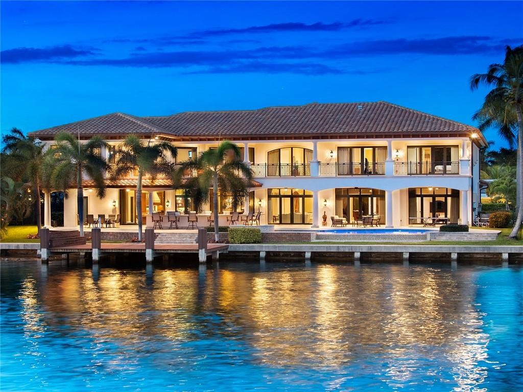 One of a kind waterfront custom estate in Coral Ridge Country Club.  Dock your mega yacht. 150 ft of dockage with 200 ft of wide water views.  Amazing water views from all the rooms.  Enjoy wine tasting in your own custom wine cellar which holds 857 bottles.   Great for entertaining with surround sound and  open floor plan.  Over 20 ft ceilings, elevator, office, fitness center, gourmet kitchen with island & more.  Relax in you stunning backyard with wonderful summer kitchen, pool and covered patio. The best outdoor living in South Florida.  Best of both worlds walk to golf or hop on your mega yacht in minutes.  Location! Location! Location! Golf, tennis, beach, restaurants all in walking distance.  The best of the best.  A must see.