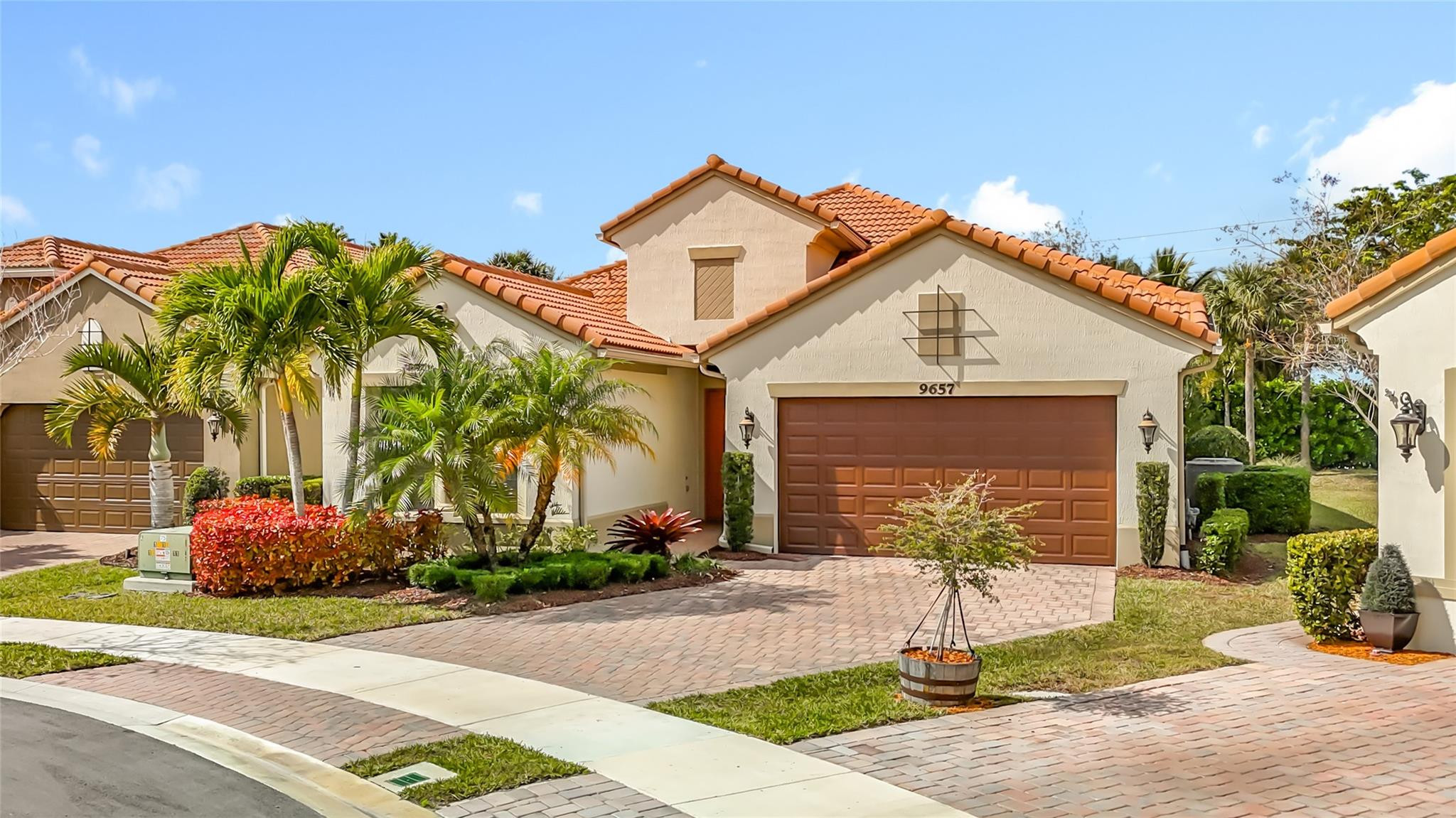 Seller is motivated! Large 3 bedroom, 2 1/2 bath Vera Model located in the Four Seasons development, a 55+ community in Parkland.  Home constructed in 2019/2020.  Has large open living/dining/kitchen area with gas cooktop, double oven, microwave, large island.  Additionally, there is a formal dining/living room. The split bedroom floor plan has 2 bedrooms at the front of the house with primary bedroom in the rear with 2 large walk-in closets, bathroom with shower and bathtub, dual sinks, and a toilet closet.  Laundry room has full size washer and dryer, upper and lower cabinets, sink.  Laundry room leads to 2 car garage. PGT windows throughout home. Screened patio overlooks the oversized lot with lush vegetation.  A must see.
