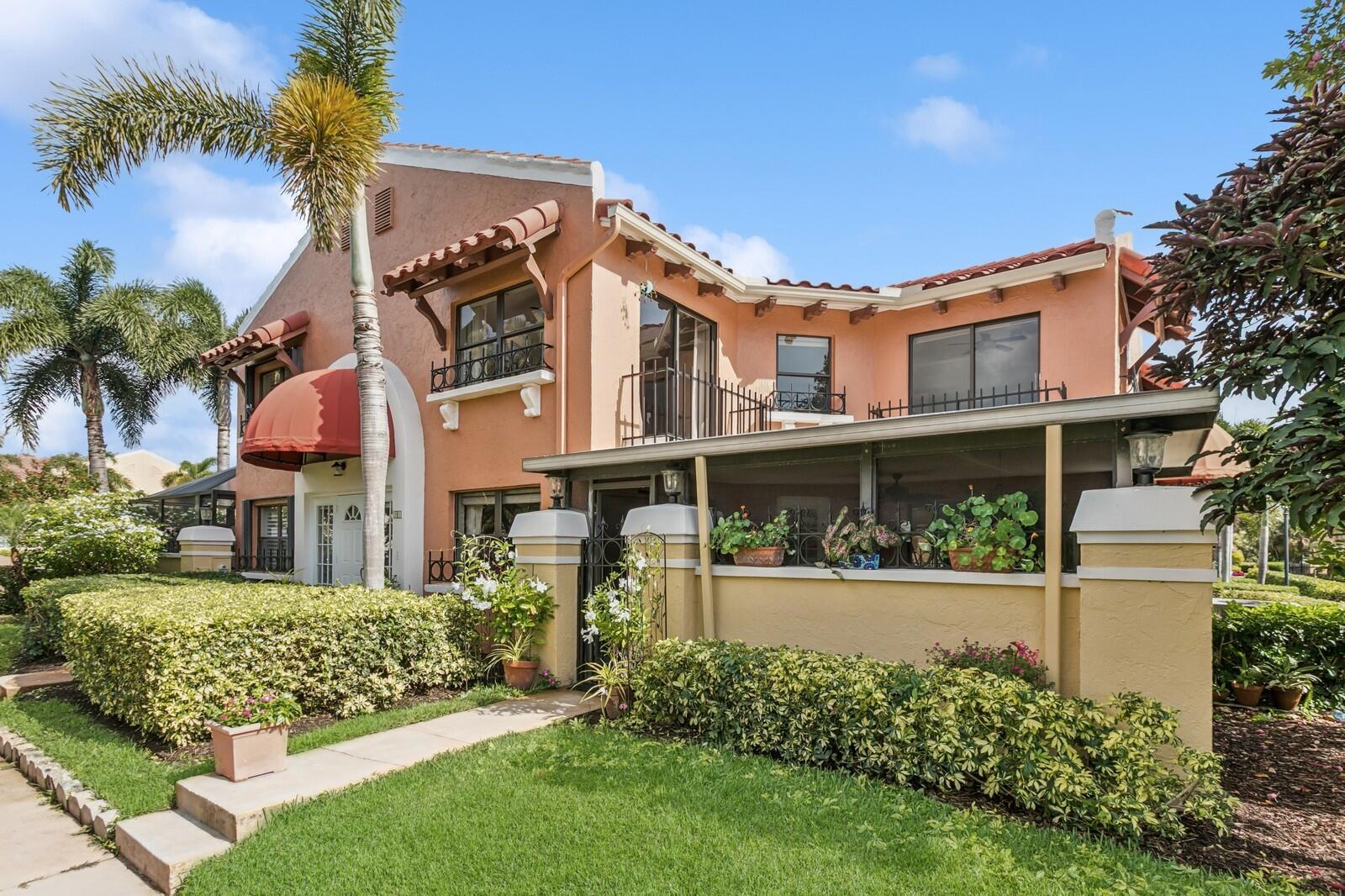Coastal villa nestled within Juno  Beach's gated Ocean Trace neighborhood. Brand New AC & Water Heater, both bedrooms offer spacious  en-suite baths, vaulted ceilings, and abundant natural light offering lush tropical views. A covered  lanai with desirable southeast exposure provides the perfect setting to  enjoy cooling ocean breezes and sun-filled days. Ocean Trace exudes  tropical charm with mature foliage, fountains, and resort-style  amenities including a community pool, spa, fitness center, & social  rooms. Ideally located near the beach, dining, & shopping. An  excellent second home or investment opportunity, rent up to four times  per year (30-day minimum). Recently painted, with all  assessments paid. Maintenance fee includes roof & exterior insurance.