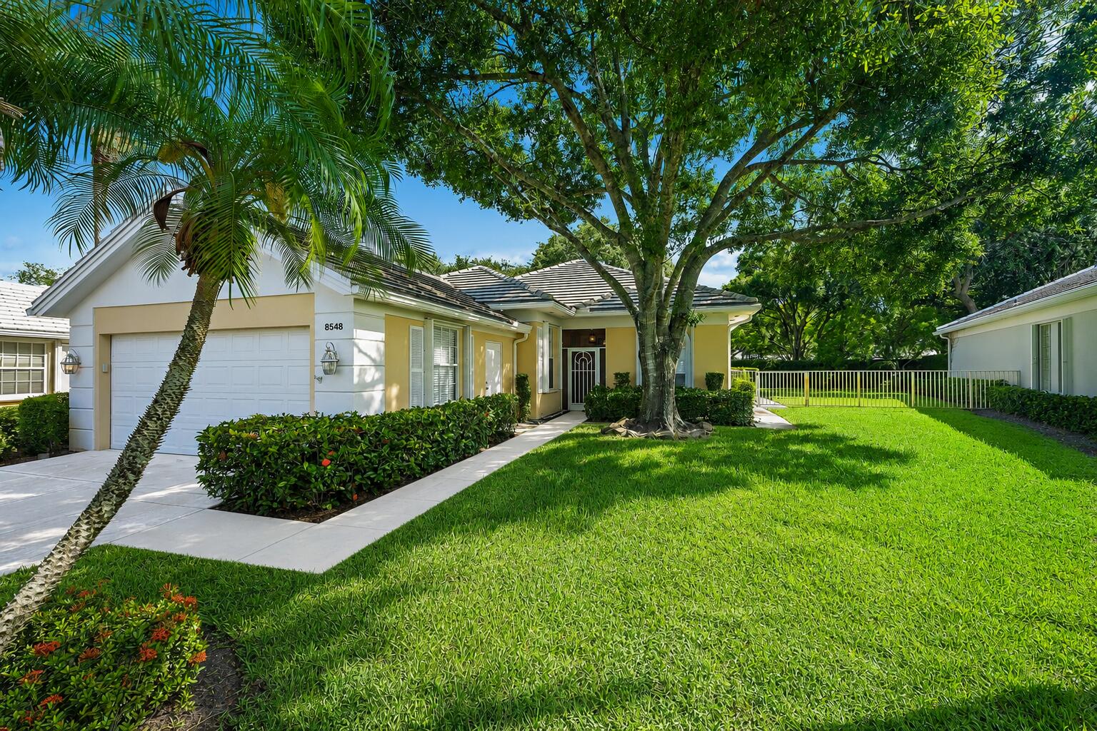 Welcome to this beautifully maintained 3-bedroom + Den, 2-bath home in the highly sought-after gated community of Garden Oaks in Palm Beach Gardens. A desirable split-bedroom floor plan features soaring vaulted ceilings, abundant natural light, spacious living areas, and a functional layout ideal for everyday living and entertaining. The expansive private backyard offers plenty of space to create your dream outdoor oasis with room for a pool. Residents of Garden Oaks enjoy outstanding community amenities, including a swimming pool, tennis and pickleball courts, and beautifully maintained common areas. Ideally located just minutes from world-class shopping, fine dining, championship golf, and pristine beaches.
