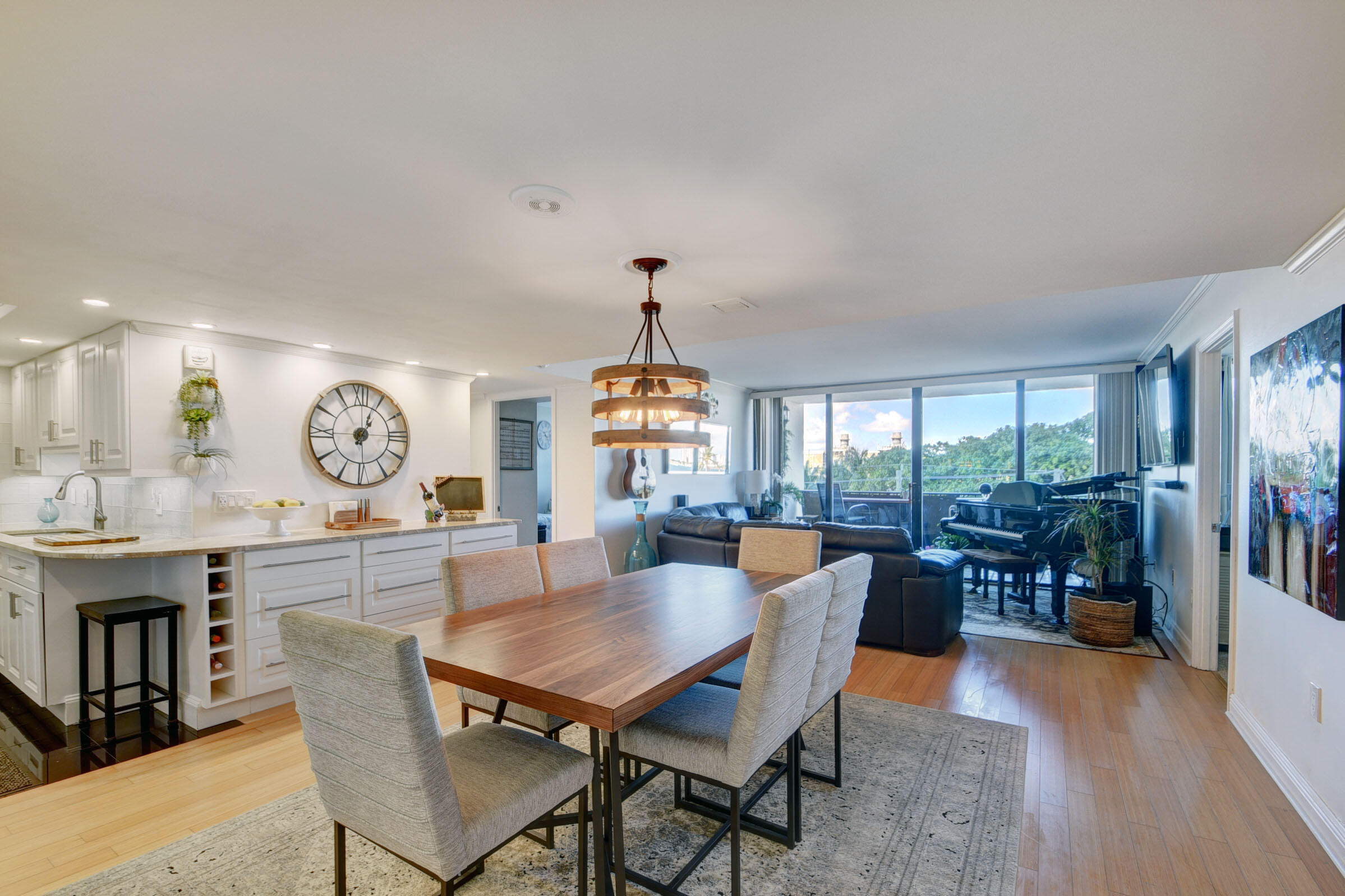 Rare 3BR/2BA beachfront condo directly on a private sandy beach along the Intracoastal in West Palm Beach. Wake up to water views and step directly onto the sand — a lifestyle few buildings can offer. This beautifully maintained, move-in-ready unit has new impact-resistant windows, washer/dryer, and AC unit, as well as updated bathrooms. The only condominium in West Palm Beach with its own on-site private beach, PBH offers resort-style amenities, including a pool, a new waterfront deck, a tiki hut, commercial grills by the sand, a fishing pier, kayaking access, boat mooring, a new gym, saunas, and a 24-hour manned guardhouse with a gated entry. 1 parking space and storage. One pet under 20 lbs allowed.  No trucks. Minutes to Palm Beach Island, CityPlace, Singer, & PBI Airport.