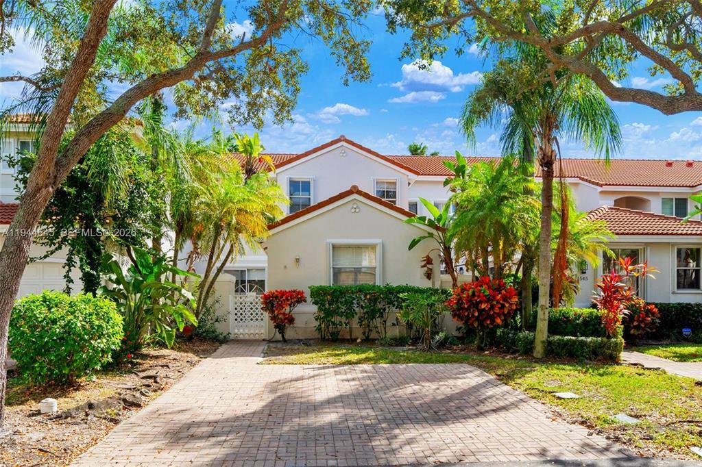 BEAUTIFUL 3/3 TOWNHOUSE TOTALLY REMODELED LOCATED IN WEST LAKE VILLAGE, WHICH IS A GUARD GATED 24/7 AND LOCATED JUST 1 MILE FROM THE OCEAN. ROOF 4-5 YEARS OLD. ALL NEW FLOORING THROUGHOUT. KITCHEN HAS BEEN OPENED UP AND OFFERS ALL NEW QUARTZ COUNTER TOPS, CABINETS, & STAINLESS STEEL APPLIANCES. ONE FULL GUEST BEDROOM & BATH DOWNSTAIRS WHILE YOU HAVE A SECOND GUEST BEDROOM AND EN-SUITE BATHROOM UPSTAIRS ALONG SIDE THE PRIMARY BEDROOM AND EN-SUITE BATHROOM THAT HAS A NEW SOAKING TUB, NEW WALK IN SHOWER AND LARGE WALK IN CLOSET. YOU WILL ENJOY THE PRIVATE COURTYARD WITH ACCESS FROM THE GUEST BEDROOM AND FROM THE LIVING/DINING ROOM WHERE YOU CAN BBQ, RELAX, OR ENTERTAIN. 2 CAR DRIVWAY. AMENITIES INCLUDE 4 TENNIS CTS, BB, HEATED POOL, GYM, PICKLE BALL, DOG PARK & KIDS PLAY AREA