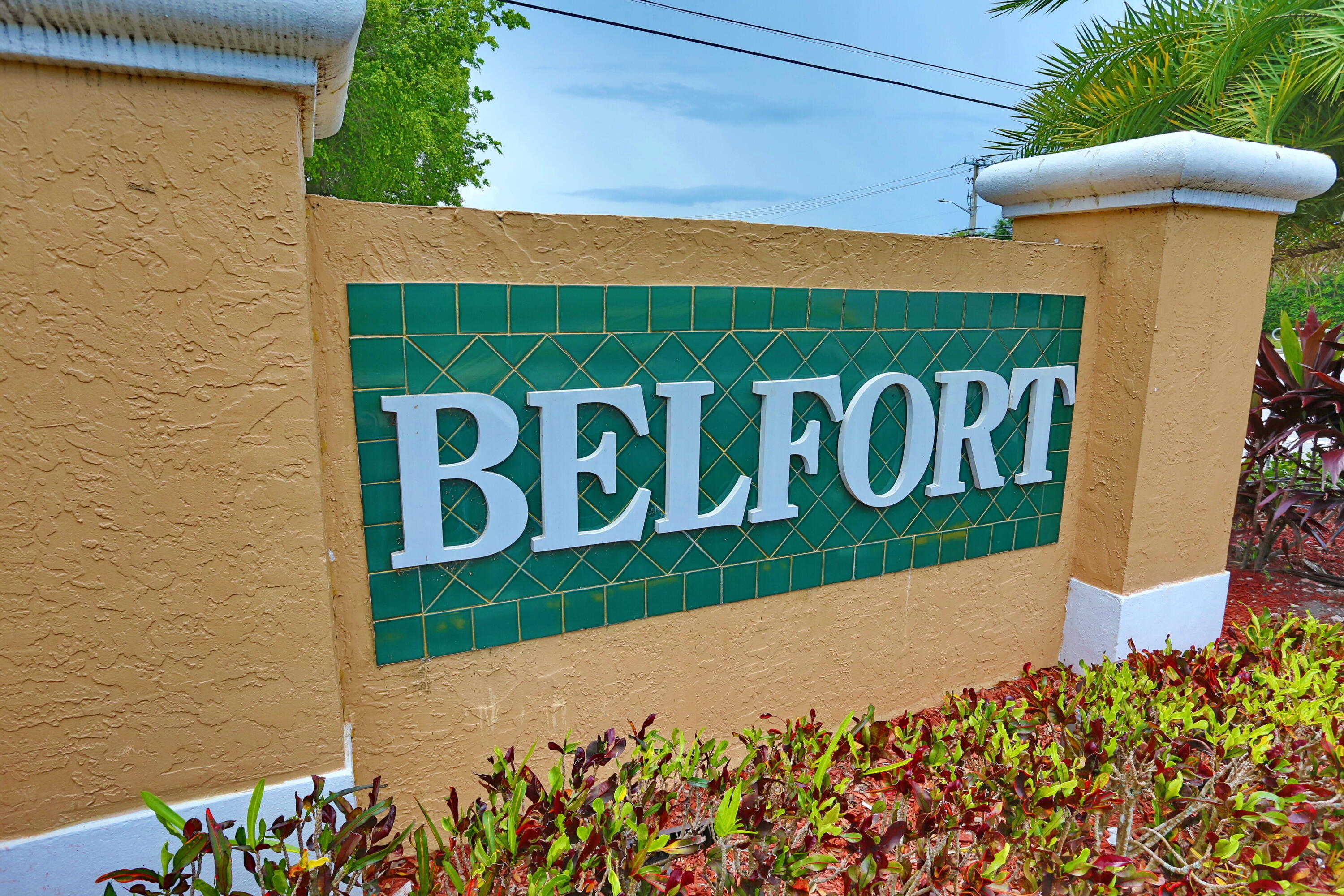 Step into this incredibly charming, first-floor corner unit that lives just like a private villa, with convenient parking right outside your door. The interior features an open floor plan with tile throughout, a large, screened-in patio equipped with a full-size washer and dryer. Beyond the unit, you will fall in love with the spectacular community amenities. The clubhouse is the heart of the action, offering activities all day long, seven days a week, alongside lively weekend shows and dances. Enjoy access to two pools and two jacuzzis (including indoor options for both). With over 100 clubs catering to every hobby and a convenient courtesy bus to nearby destinations, this community offers an unmatched lifestyle. Renting is permitted if desired. Please call with any questions