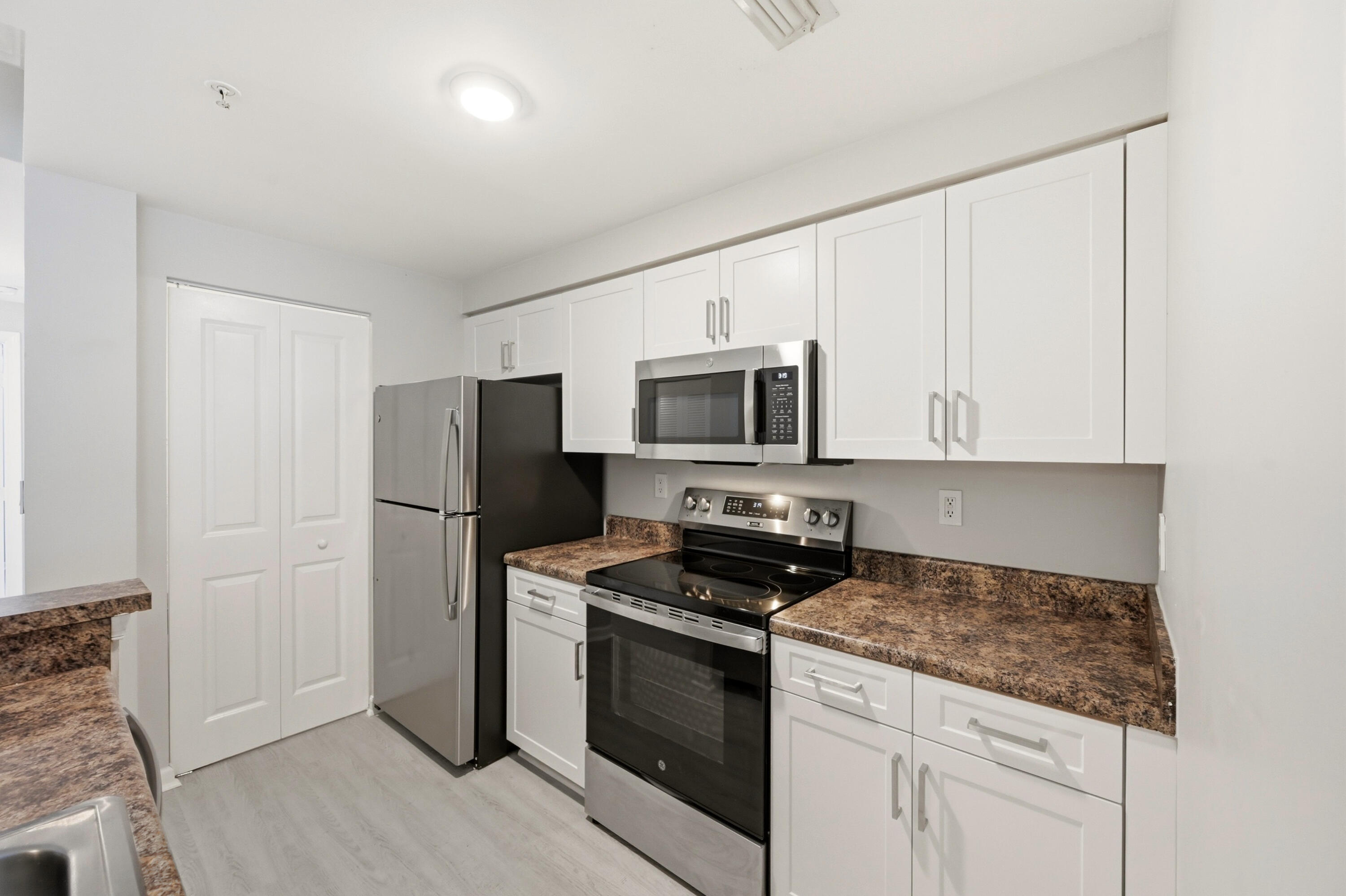 EL-AD POINCIANA CONDO - Residential