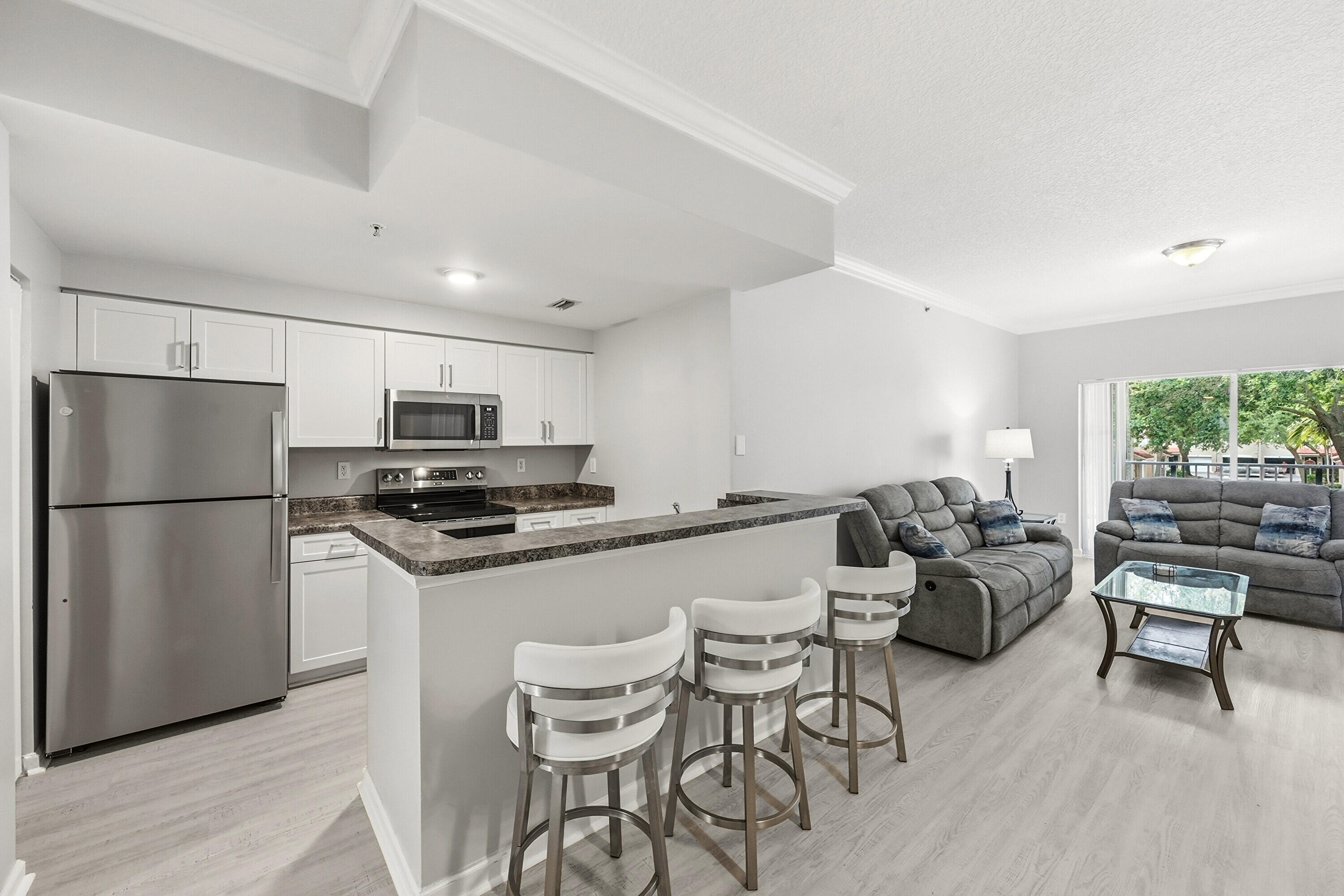 EL-AD POINCIANA CONDO - Residential