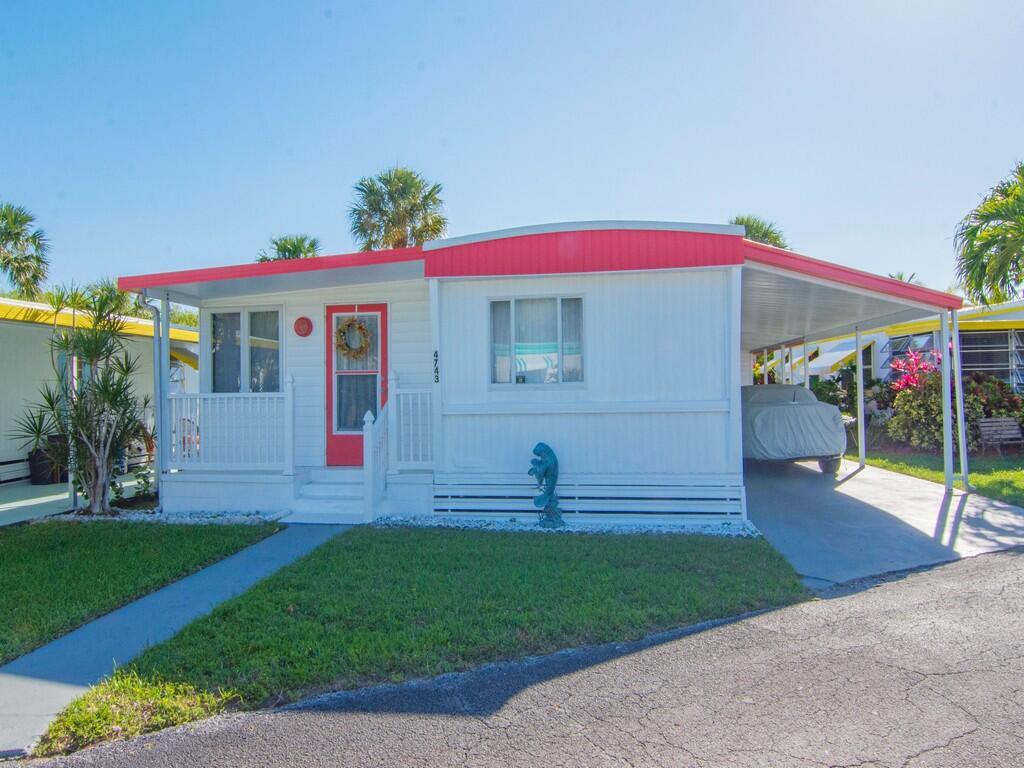 Check out this beauty located just minutes from downtown Jensen Beach.  This 2/1.5 mobile home has been completely renovated with new windows, flooring, electrical and the Florida room has been converted to make extra living space. The home comes furnished and is tastefully decorated. This 55+ mobile home park is a hidden gem on the Indian River.  HOA is only $325 a month and covers cable, water, lawn maintenance, and all the amenities of the HOA which include heated pool, shuffleboard and a community dock.