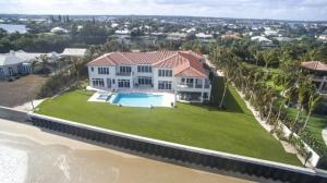 ''Villa Oceano Azul'', with radiant beauty, this magnificent estate sits like a jewel between the Atlantic Ocean and Intracoastal Waterway in the sought-after but rarely available estate section of Manalapan Beach.  Just completed, this showpiece estate culminates the masterful collaboration of talents by Carnegie Hill Development Corporation, The Benedict Group architects, and  Dale Construction. SEE SUPPLEMENT...The information herein is deemed reliable and subject to errors, omissions or changes without notice.  The info has been derived from architect plans,county records.Buyer should verify measurements.Letter of financial capability from the buyer is necessary to show. At one with the ocean's alluring beauty, "Villa Oceano Azul" brings to life a sensational seaside paradise in Manalapan's prestigious Estate Section, directly fronting the Atlantic Ocean and stretching to the Intracoastal Waterway, complete with dockage, on a prized span of South Florida's barrier island.  This lavish, brand-new estate compound combines the expertise of Dale Construction Corporation with the creative vision of Carnegie Hill Development and Marc-Michaels Interior Design, consistently ranked among the world's top designers by Interior Design magazine, an industry-leading authority.

Poised on an emerald sweep of oceanfront lawns, the impressive European-inspired villa, views the gorgeous blue ocean from most rooms.  All overlook either of the sprawling pool terraces that open both east and west in a fluid indoor/outdoor flow for the ultimate in resort-style living.

Entered from the palm-framed east terrace, the airy front-to-back reception room expands the view to the west terrace and the ocean.  The room's perfect proportions, refined details, and muted coastal-inspired hues give classic elegance a fresh, sophisticated modern twist, establishing the overall theme of the exquisitely finished and furnished interiors. Special accoutrements for entertaining include the chic and luxurious club room and hotel-inspired wine room. 

In addition to the separate guest house, the six bedrooms in the main residence feature luxe master quarters that create a serene oceanfront retreat.  Each of the baths is attired in its own distinctive ensemble of select stone finishes.  A meticulously fashioned Ocean-to-Intracoastal showplace, "Villa Oceano Azul" leaves no detail overlooked and nothing to be desired.

Location
South Ocean Boulevard, Manalapan, Florida.  Few places in the world rival the lifestyle of Manalapan, an idyllic oceanfront hamlet on the barrier island just south of Palm Beach.  Manalapan residents enjoy deeded club privileges at the Five-Diamond Eau Palm Beach Resort & Spa.

Property
"Villa Oceano Azul" basks in spellbinding beauty on 200Â± feet of direct oceanfront, and also fronts 200Â± feet on the Intracoastal Waterway equipped with a full-service concrete dock.  On the sprawling 1.5Â±-acre grounds, two gated entries give way to the sweeping motor court that leads to the main residence and guest house, with garages totaling six bays.  The beautiful walled and gated west pool terrace serves as both the entrance courtyard and an outdoor entertaining space.  All rooms on the ocean side of the residence open to the east terrace featuring a pool with spillover spa plus a dining loggia with summer kitchen.  In this breathtaking resort-like oceanfront paradise, lush lawns stretch to the sea-walled shoreline with stairs to the sands.

Residence
Designer finished and furnished, this stunning European-inspired villa creates graciously livable rooms in a grand total of 20,712Â± square feet with seven bedrooms, nine full and four half baths, including the guest house.  Myriad amenities include CGI impact-glass windows and exterior doors, two elevators, upstairs/downstairs laundry rooms, 11-zone air conditioning, Crestron smart-house automation, security system and a generator that can power the entire house.

First Floor:  Giving an immediate view of the ocean, iron-filigreed glass doors enter the front-to-back reception room set off by refined moldings and geometric-patterned inlaid marble floors that infuse classic style with a modern feel.  Next to the sweeping staircase is the guest powder room.  The oceanfront living room creates a sense of layered luxury with a coffered ceiling and sleek built-ins that frame the onyx-encased ribbon fireplace.  Adjoining in an effortless open flow, the stunning dining room views both the ocean and front courtyard, and is served by a hotel-inspired walk-through wine room with 1,800Â±-bottle capacity.  Connecting through a butler's pantry, the showpiece kitchen has hand-crafted cabinetry, marble counters, and dual islands, one with a breakfast bar.  Professional-style appliances include the six-burner Wolf gas range with double ovens, two Sub-Zero refrigerators and freezers, Sub-Zero wine cooler, and three Bosch dishwashers.  The butler's pantry has a Wolf oven, microwave, and warming drawer plus a Miele steamer and coffee/espresso system.  Capturing the ocean view, the kitchen's casual dining area segues into the oceanfront family room with full-service bar, sleek media center, and glass doors across the poolside loggia.  River rock finishes adorn the adjacent powder room.  Across the reception room, the expansive club room is a stunning entertainment space featuring a professional-style wet bar, billiard area, media center, and sliding glass doors across the west pool terrace.  On the east side, two sets of loft-style sliding glass doors enter the custom-fitted oceanfront study/office and the oceanfront exercise studio with its full bath doubling as the cabana bath.  Separate staff quarters contain a sitting room/kitchen, bedroom, and bath.

Second Floor:  Open to the reception room below, the loft-style oceanfront lounge is served by a powder room.  Double doors enter the voluminous oceanfront master suite which stretches from front to back in a private wing.  Serene and subtly glamorous, the master bedroom overlooks the ocean through the open sitting room leading to an oceanfront balcony for relaxing outdoors.  Two wardrobe rooms accompany the suite's two ultra-luxurious baths.  Finished in marble, onyx, and mother-of-pearl, one is an exquisite salon-like retreat with jetted tub, multi-head shower, and separate water closet.  With marble and glass mosaic tile finishes, the other master bath has a multi-head shower and separate water closet.  Next to the master bedroom, loft-style sliding glass doors enter another versatile oceanfront room ideal for an office, gym, or nursery.  In the other wing, four more bedroom suites, one facing the ocean, are accompanied by a sitting room with oceanfront balcony.

Guest House:  Across the motor court from the main residence, the private guest house is comprised of a living room, kitchen, bedroom, full bath, powder room and laundry space.

Disclaimer: The information provided herein including but not limited to measurements, square footages, lot sizes, calculations and statistics have been obtained and conveyed from third parties such as the applicable Multiple Listing Service, public records as well as other sources. All information including that produced by the Sellers or Listing Company are subject to errors, omissions or changes without notice and should be independently verified by any prospect for the purchase of a Property.  The Sellers and Listing Company expressly disclaim any warranty or representation regarding all enclosed information.  Prospects' use of any information herein is acknowledgement of this disclaimer and that Prospect shall perform their own due diligence.  Prospects shall not rely on this information when entering into a contract for sale and purchase.  Some affiliations may not be applicable to certain geographic areas. If your property is currently listed, please do not consider this a solicitation.   In the event a Buyer defaults, no commissi