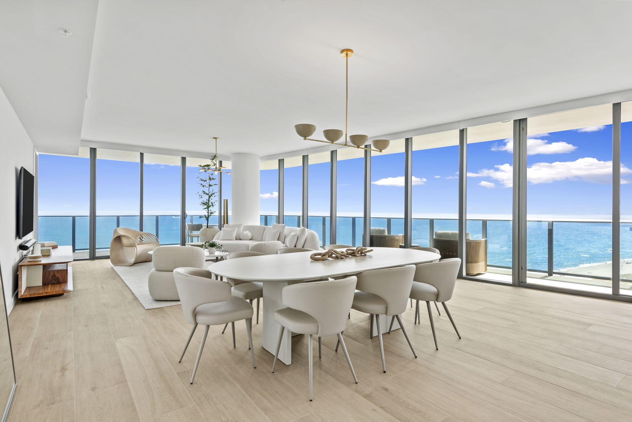 Experience the newest standard of luxury beachfront living at Casamar. Residence 1501 is one of the most desirable corner residences, brand-new and never lived in, offering 4BD/4BA + den fully furnished with breathtaking sunrise-to-sunset views. This expansive corner unit features floor-to-ceiling glass, multiple terraces for seamless indoor-outdoor living, and porcelain flooring throughout. Designer kitchen with Italian cabinetry, Wolf & Sub-Zero appliances, and gas range. Spacious primary suite with spa-like bath and dual closets. Includes 2 parking spaces and a private storage unit. Resort-style amenities include valet, concierge, pools, fitness center, and more.