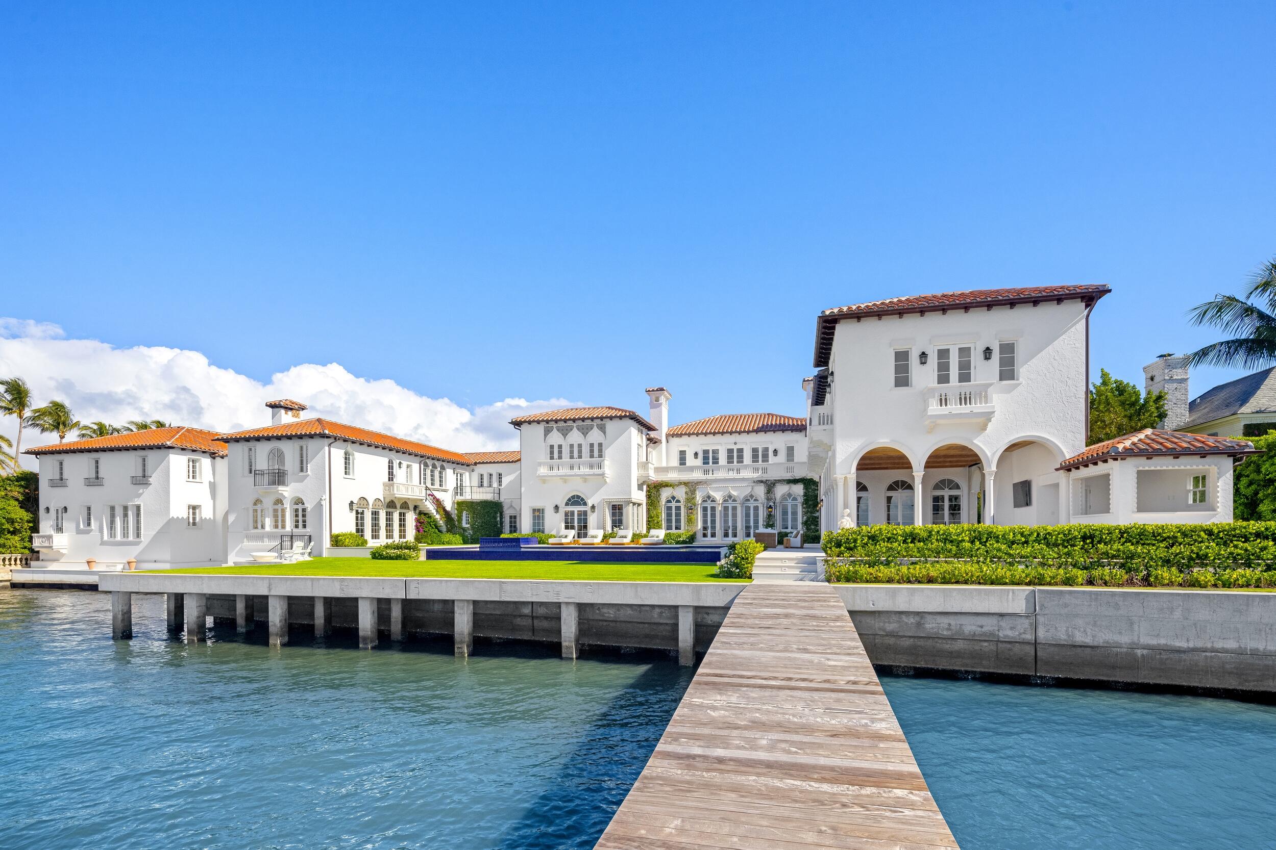Introducing ''Casa del Ensuenos'', one of the most iconic renovations in Palm Beach history. This is truly a one-of-one, legacy opportunity in South Florida and an extraordinarily rare chance to own a completely gut-renovated piece of landmarked history along the Palm Beach island waterfront. Located ideally in the Estate Section and just minutes from global luxury destinations like Worth Avenue, Mar-a-Lago, and the growing presence of ''Wall Street South'' in downtown West Palm Beach, this generational slice of paradise just completed a multi-year reimagination, turning this historic Mizner into a contemporary marvel with all of the modern conveniences. With the newly finished reconstruction yet to be resided in, few (if any) compounds of this magnitude and quality exist in such a prime South Florida location as this. Sitting on a nearly 1.5-acre direct waterfront lot along the Intracoastal with 200 feet of frontage, this gated estate features a sprawling 15 bedrooms and 18 full bathrooms spread out amongst an expansive 27,000 +- total square feet of elite Palm Beach living, alongside a private, sunken, red clay tennis court. The home consists of a main house, boat house, tennis pavilion, and a six-car garage. Other not-to-be-missed bespoke amenities of this trophy residence include an expansive covered loggia, a full performing arts theatre with stage, chef's kitchen, comprehensive security camera system, a new seawall, generator, elevator, exquisite exterior landscape lighting, eight fireplaces, and a heated infinity pool with swim-resistance jets. Perfectly positioned directly on the Intracoastal waterway and looking out towards the private docks with a 40,000 lb boat lift, this uniquely elegant residence is a perfect blend between accessibility to the quaint, charming Town of Palm Beach as well as proximity to the bustling downtown of West Palm Beach. Enjoy sunsets from the seclusion of this prestigious, western-facing, and sublimely executed Venetian-style Palm Beach resort masterpiece, complete with beach access just a few steps away. Staging and furnishings by Vesta Home; all furniture available for purchase.


DISCLAIMER: Information published or otherwise provided by the listing company and its representatives including but not limited to prices, measurements, square footages, lot sizes, calculations, statistics, and videos are deemed reliable but are not guaranteed and are subject to errors, omissions or changes without notice. All such information should be independently verified by any prospective purchaser or seller. Parties should perform their own due diligence to verify such information prior to a sale or listing. Listing company expressly disclaims any warranty or representation regarding such information. Prices published are either list price, sold price, and/or last asking price. The listing company participates in the Multiple Listing Service and IDX. The properties published as listed and sold are not necessarily exclusive to listing company and may be listed or have sold with other members of the Multiple Listing Service. Transactions where listing company represented both buyers and sellers are calculated as two sales. "No payments made until title passes" Some affiliations may not be applicable to certain geographic areas. If your property is currently listed with another broker, please disregard any solicitation for services. Information published or otherwise provided by seller, listing company or its representatives is deemed reliable but are not guaranteed and subject to errors, omissions, or changes without notice. Copyright 2026 by the listing company. All Rights Reserved.