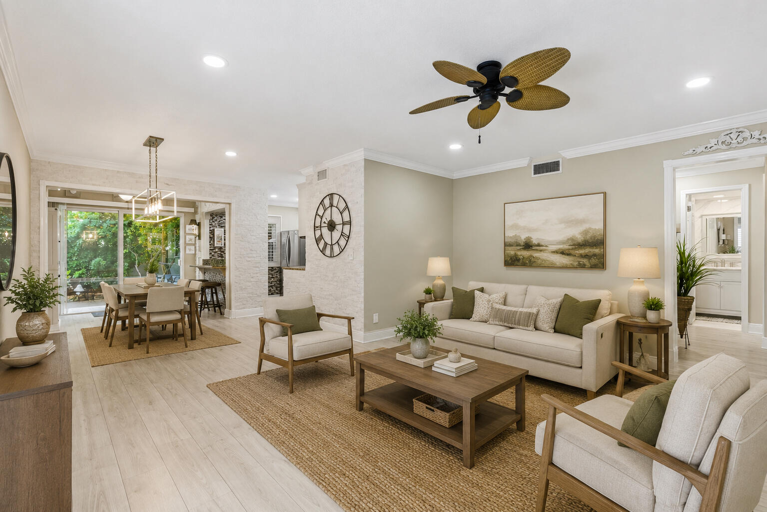 Experience the ultimate South Florida lifestyle at Colonial Club, a highly sought-after 55+ Intracoastal community offering resort-style living in the heart of Boynton Beach. This beautifully renovated and spacious 1-bedroom, 1.5-bath corner residence is perfectly positioned in one of the community's most peaceful and private settings, surrounded by lush tropical landscaping, swaying palms, and coastal breezes. Enjoy your own expansive statuary-style patio with serene garden views — the perfect retreat for morning coffee, evening cocktails, or effortless outdoor entertaining.  Inside, this move-in-ready residence showcases a bright coastal aesthetic with hurricane impact windows, crown molding, custom kitchen island cabinetry, stainless steel appliances, decorative stone accent walls, updated lighting, luxury vinyl flooring, beautifully renovated bathrooms, custom closets, and a newer A/C and water heater. Every detail has been thoughtfully curated to create a stylish yet comfortable tropical escape. Residents enjoy exclusive access to Colonial Club's stunning Intracoastal clubhouse featuring a heated saltwater pool, BBQ area, and scenic 1,500-foot waterfront promenade perfect for sunset walks and watching yachts cruise by. With completed building recertifications, strong reserves, and major community upgrades already paid in full, this is carefree waterfront living at its finest.