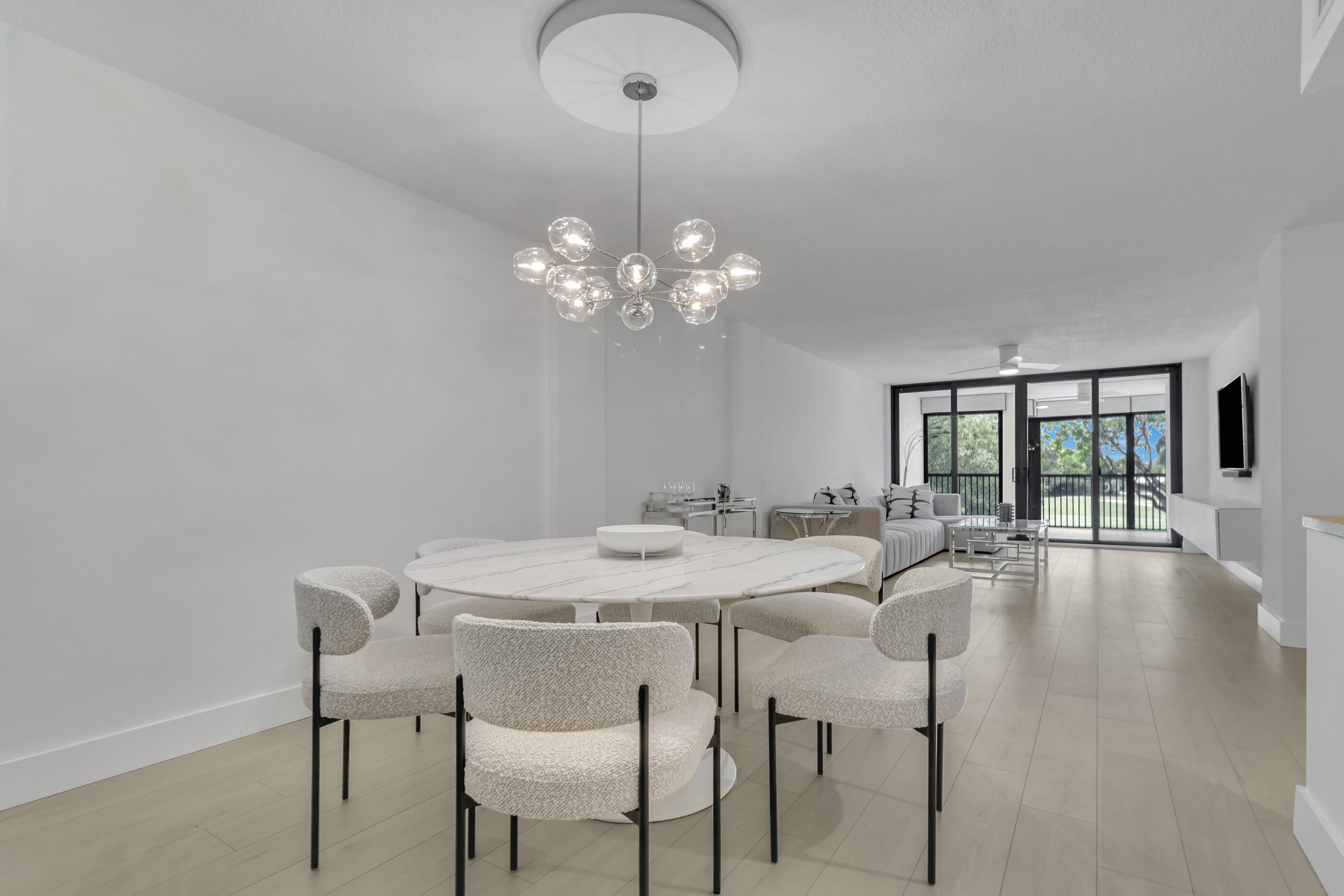 Completely renovated and professionally designed 2-bedroom, 2.5-bath condo in the desirable gated community of Grandview. Offering 1,383 sq. ft. plus a screened patio with beautiful water views, this move-in-ready home features an in-unit washer and dryer, covered parking, and a private storage unit. Enjoy 24-hour security and resort-style amenities including a pool, jacuzzi, brand-new fitness center, clubhouse with billiards and table tennis, and on-site management. Ideally located near houses of worship, parks, shopping, and major highways. Don't miss this exceptional opportunity!
