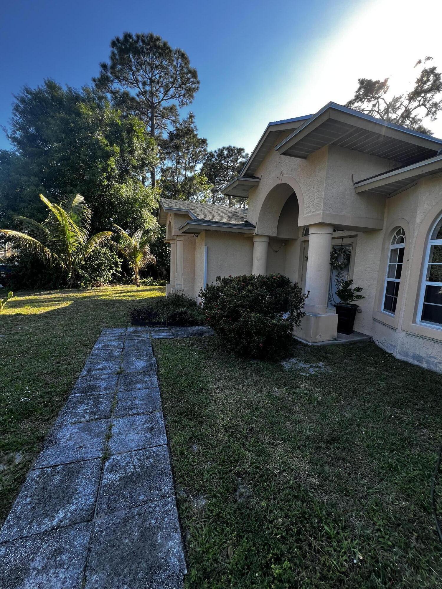 Welcome to this charming and thoughtfully updated 1-bedroom residence nestled in a peaceful Port St. Lucie neighborhood. Offered Unfurnished, spacious apartment features a generously sized bedroom, full bath with shower and soaking tub, and two oversized walk-in closets.  Enjoy a beautifully updated kitchen and dining area complete with brand-new appliances and your own private side entrance for added privacy and comfort. Utilities and WiFi are included -- making this a truly turnkey opportunity.  No HOA. Conveniently located near shopping, dining, and schools. Comfort, convenience, and privacy -- all in one place.