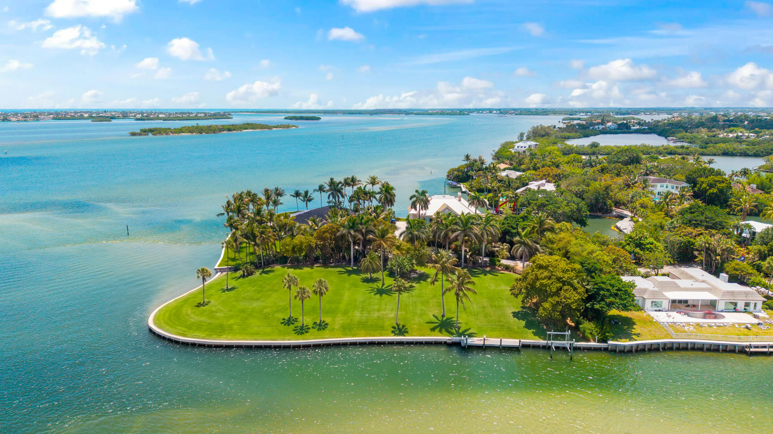 Rare opportunity to build a custom waterfront estate in the prestigious Archipelago section of South Sewall's Point. This .59-acre corner point lot offers approximately 240± feet of water frontage with expansive views overlooking Bird Island and the surrounding turquoise waterways. Cleared and ready for construction, the property provides the ideal setting to create a private coastal retreat with panoramic sunrise and sunset views. Enjoy boating, fishing, paddleboarding, and the ultimate waterfront lifestyle just minutes from downtown Stuart, beaches, restaurants, and marinas. A truly exceptional opportunity in one of Sewall's Point's most desirable waterfront enclaves.