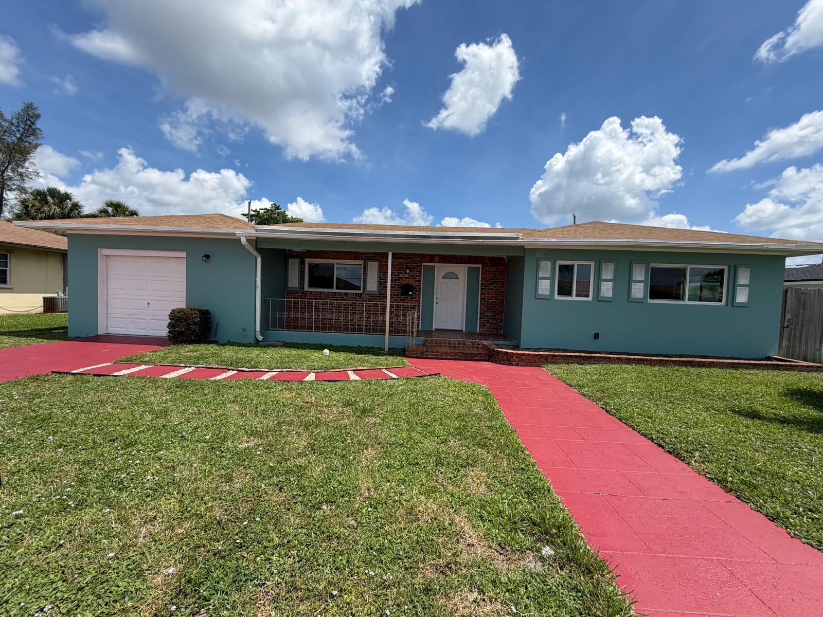 Charming and spacious home that beautifully blends classic character with modern updates in a quiet West Palm Beach neighborhood. Ideally situated directly across from the water, this property offers a peaceful setting with scenic surroundings while remaining just minutes from Downtown West Palm Beach, major shopping, dining, entertainment, and convenient access to I-95. The home's thoughtful combination of traditional charm and contemporary touches creates a warm and inviting atmosphere, perfect for comfortable living and entertaining. Enjoy the best of both worlds—tranquil waterfront surroundings and easy access to everything South Florida has to offer. Existing well; condition/function unknown. The storage shed located in the rear yard is excluded from the sale and will not convey.