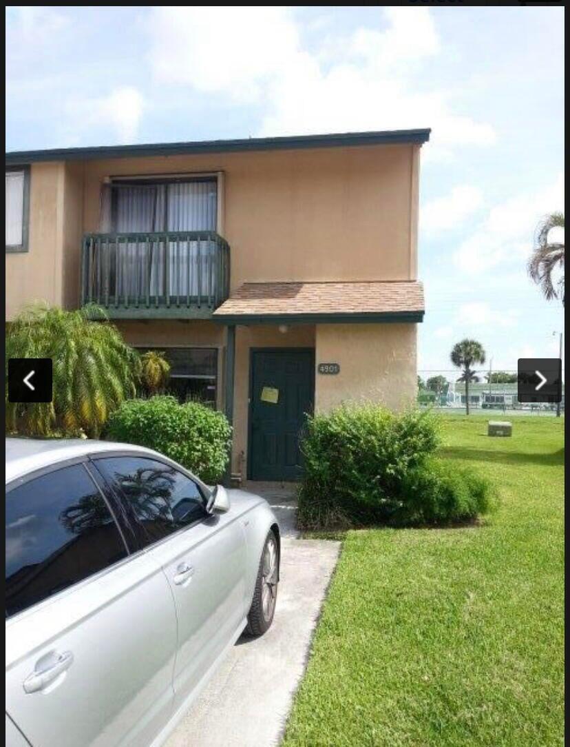 Bright and airy Townhome centrally located in the heart of Greenacres.  Discover this spacious corner unit featuring 3-bedroom, 2.5-bathroom , Brand new fridge, new floors , new baseboards, new  A/C system 2026,  close to shopping, dining, schools, and major highways, private rear screened covered patio perfect for relaxing or entertaining. Investors welcome. No rental restrictions.