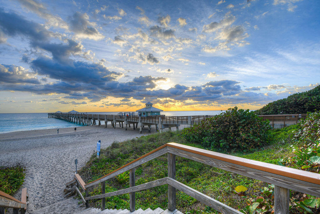 Life is good! Enjoy this exceptional opportunity to own a piece of Juno Beach in this remarkable community.. Being offered is a vacant lot where you can park your RV or you can add a new modular home to this sizeable lot, one of the nicest in the community. Located across the street from the pristine Juno Beach, and just a short walk to restaurants, shopping & Publix. This well-maintained community offers many amenities including heated pool, pickle ball, shuffleboard, playground, exercise rm, tiki area, clubhouse & organized social events & activities. It offers flexibility for seasonal enjoyment, a weekend retreat, full-time living or rental income potential. Juno Beach is just a short drive to PBI airport, many golf courses. Experience the best of beachside living today!