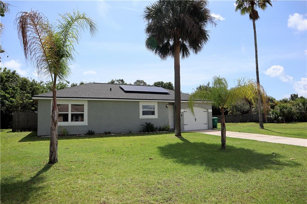 Buyer's financing fell apart at the last minute.  Move In Ready! Great 2 Bedroom / 2 Bath home with large lot that backs up to private woods.  Room for your RV, Boat, Garden and a pool! Brand New 2022 Roof with New Solar System - Minimum electric bills! New 2023 flooring throughout 2019 AC, New Windows, Stainless Steel appliances, cabinets, counters and water heater.  Solar cost included in price.