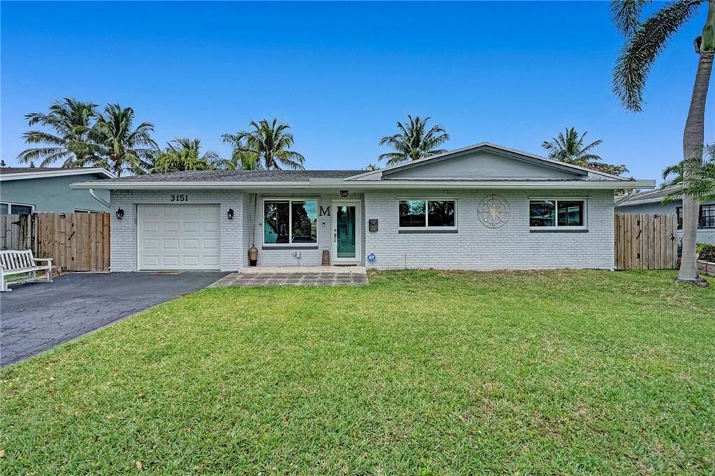 Centrally located this 4 bedroom, 2 bathroom, 1 car garage home is close to both the FL Turnpike and i95. Lots of natural light, open kitchen, large backyard with covered patio and a full sized pool. Master has a walk in closet. Upgraded guest bathroom. This beautiful home comes with a newer roof installed in 2019 which comes with a 10 year warranty that is transferable to the new owners limited warranty till 07/22/2029. Impact windows and doors installed 2018, vinyl flooring throughout the house, new pool pump/filter casing installed in 2020/2021, new fence installed all around the premises in 2020, great for any pet owner & updated electrical panels installed in 2022. Newly remodeled rooms and floors throughout the home Best of all NO HOA. This home wont last!