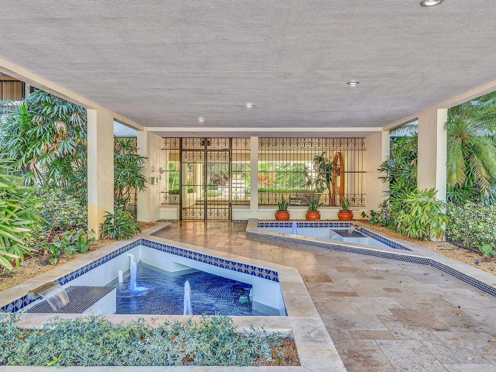 Gorgeous corner 3/2 with wraparound balcony facing southeast for awesome views of  surrounding canopy. Fabulous location with easy access to East & West Boca areas. Over 1,700 sf of space that feels like a house when you enter into the unit through the lovely foyer. There is access to the balcony through sliding doors in every room. Bathrooms & kitchen  high end renovations with kitchen cupboards adding additional storage. Complete hurricane accordion shutters & partial impact hurricane glass. Mediterranean style courtyard building is secure & private, marble flooring & fountains , 2 elevators, updated parking areas, pool, meeting/social spaces with separate kitchen & exercise room. All assessments paid. Full reserves. Integrity report & concrete restoration done. Roof 2025, Bldg. WH 2026!