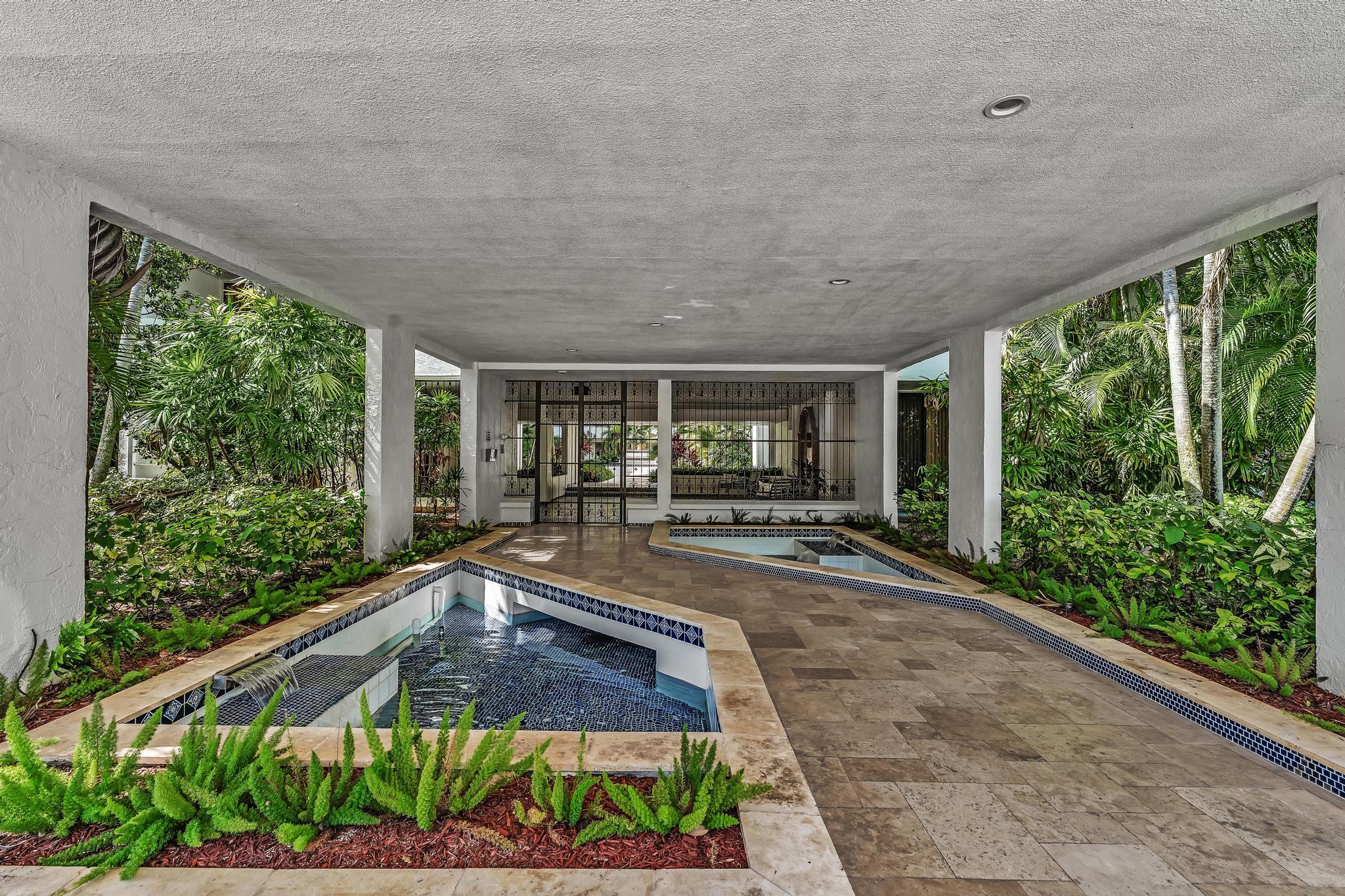 Gorgeous corner 3/2 with wraparound balcony facing southeast for awesome views of  surrounding canopy. Fabulous location with easy access to East & West Boca areas. Over 1,700 sf of space that feels like a house when you enter into the unit through the lovely foyer. There is access to the balcony through sliding doors in every room. Bathrooms & kitchen  high end renovations with kitchen cupboards adding additional storage. Complete hurricane accordion shutters & partial impact hurricane glass. Mediterranean style courtyard building is secure & private, marble flooring & fountains , 2 elevators, updated parking areas, pool, meeting/social spaces with separate kitchen & exercise room. All assessments paid. Full reserves. Integrity report & concrete restoration done. Roof 2025, Bldg. WH 2026!
