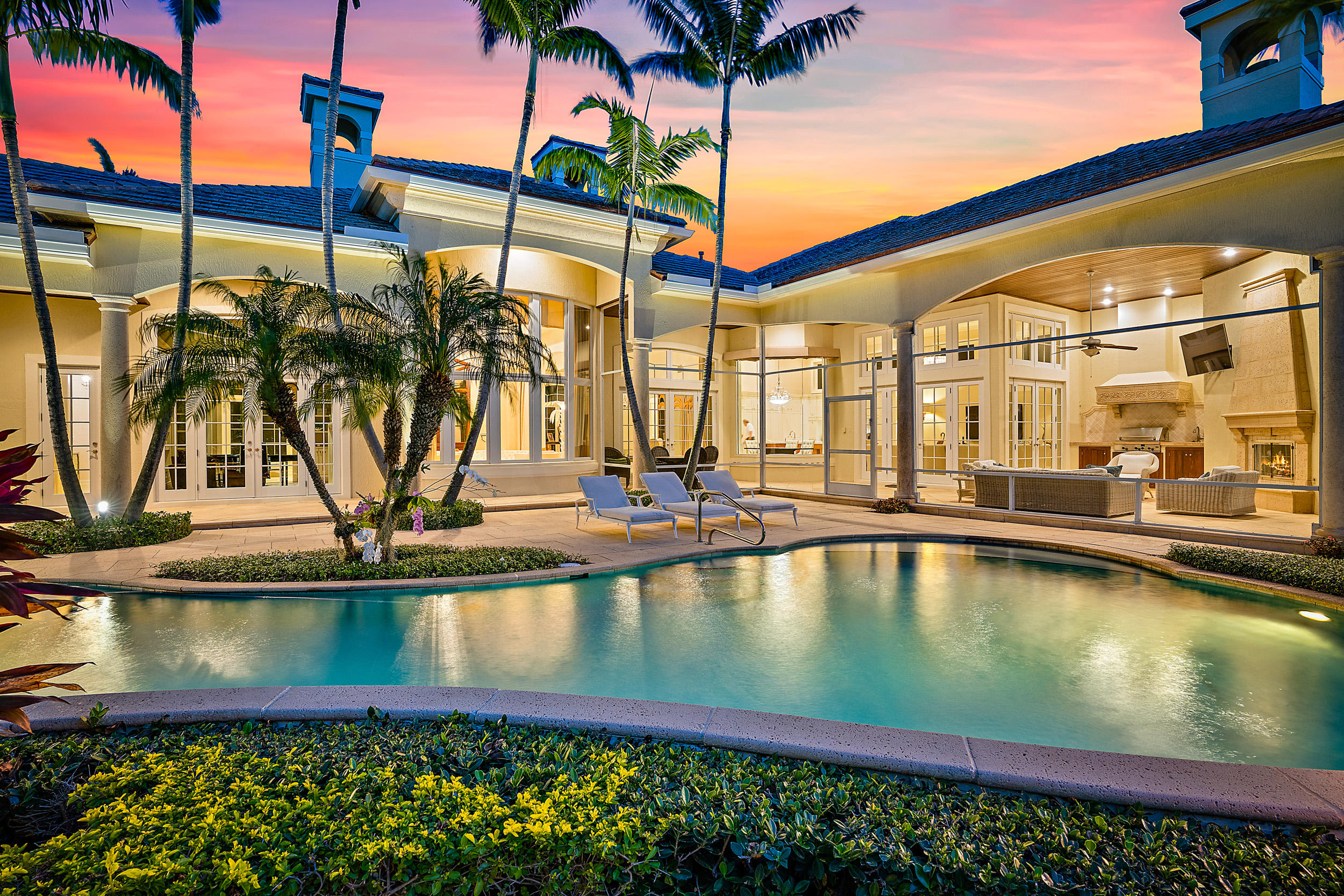 Spectacular Seminole Landing home! Freshly renovated in 2014 with new kitchen,landscaping and baths. New roof and full service dock installed in 2018. This magnificent home features elegant master bedroom, library and 2 guest suites on the ground floor. Additional second floor living space with 2 more private suites. Open kitchen and family space flow perfectly into spacious pool and outdoor entertaining area. Hurricane impact glass throughout protects exquisite flooring and finishes. 1.25 Acres of peace and privacy just steps from the Atlantic Ocean and Seminole Golf Club. A great home in a classic Palm Beach county community.