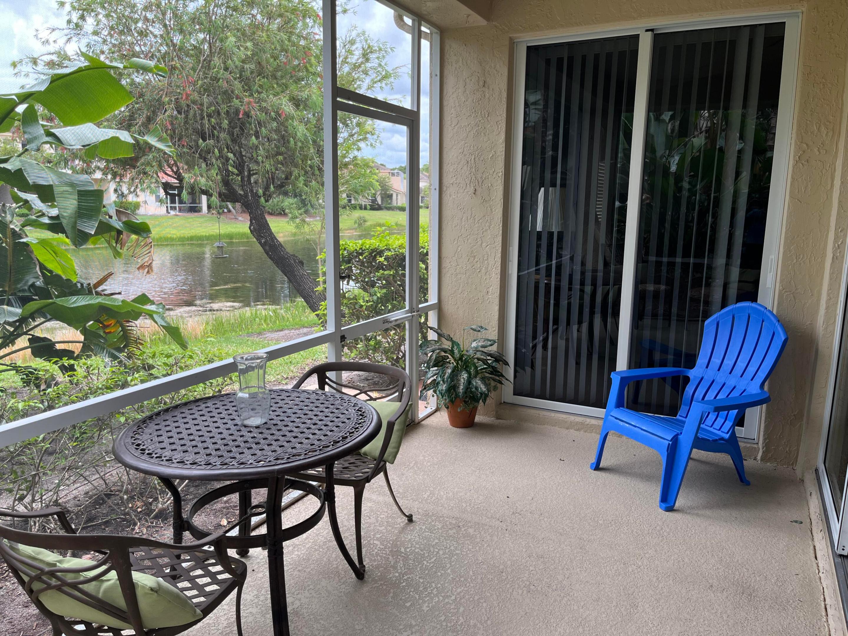 One-story fully furnished, turnkey townhome in Castle Pines with a 1-car garage. Extra light and bright spacious end unit with 3 bedrooms and 2 baths. Freshly painted interior.  Volume ceilings, great kitchen, screened lanai with views of the water and lush greenery. Plenty of guest parking nearby; close to community mailboxes. Amenities include a refreshing pool and spa. Longer-term tenants have access to PGA's Island Club amenities, including a fitness center, tennis and pickleball courts, and clubhouse. PGA Golf Club offers 54 holes of golf with options for greens fee play and memberships. Only available for annual lease.