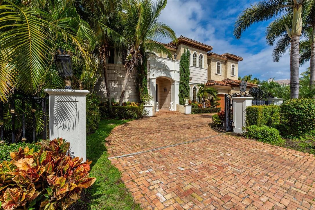 This exquisitely and professionally decorated waterfront home features 6 bedrooms,(2 master suites) formal dining room, large working office and state of the art movie theater with stadium seating. The gourmet kitchen with Butler’s pantry contains top of the line appliances. Home is complete with impact windows and doors, 3 car garage and a gated entry. Lutron lightning system and security cameras. An elevator eases access to the upper level. A magnificent pool and spa, outdoor kitchen area with concrete dock complements the outdoors. Located in a prestigious Lighthouse Point on 1/4 acre professionally landscaped lot. Just minutes from Hillsboro Inlet, with spectacular view of the canal. This is your ideal home for entertaining. By appointment only. Agent has personal interest.