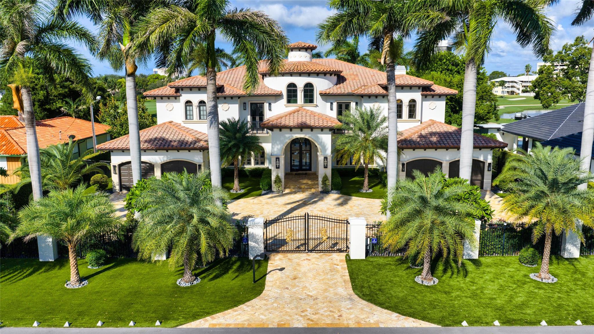 Gated Palm Beach-inspired Coral Ridge CC Estate sited on 120+/- ft of the verdant golf coarse and lake views. An expansion motor court greets guests to an impressive double glass door entry that opens to a  rotunda foyer with a graceful floating staircase that sets the stage for this magnificent reimagined estate with slab porcelain flooring throughout. A Grand salon with soaring ceilings opens to the adjacent chefs gourmet double island kitchen, formal dining room and family room.  Also provided on this level is a VIP suite and fitness room. The second level features the Primary suite with sitting room, duel boutique-style closets, spa-like bath and private fairway balcony, 2 Additional bedrooms suites and loft accommodate family and guests (Continue on Supplement Remarks). Outdoor entertaining is enjoyed at the grand loggia, resort-style Pool with expansive marble patio and yard. Other amenities include an Fort Knox-like security/monitoring system, elaborate exterior lighting package, manicured maintenance-free turf and sculptured perimeter hedging, elevator, 5 fireplaces and 4 bay garage. Shown by Appt only.DISCLAIMER: Information published or otherwise provided by the listing company and its representatives including but not limited to prices, measurements, square footages, lot sizes, calculations, statistics, and videos are deemed reliable but are not guaranteed and are subject to errors, omissions or changes without notice. All such information should be independently verified by any prospective purchaser or seller. Parties should perform their own due diligence to verify such information prior to a sale or listing. Listing company expressly disclaims any warranty or representation regarding such information. Prices published are either list price, sold price, and/or last asking price. The listing company participates in the Multiple Listing Service and IDX. The properties published as listed and sold are not necessarily exclusive to listing company and may be listed or have sold with other members of the Multiple Listing Service. Transactions where listing company represented both buyers and sellers are calculated as two sales. “No payments made until title passes” Some affiliations may not be applicable to certain geographic areas. If your property is currently listed with another broker, please disregard any solicitation for services. Information published or otherwise provided by seller, listing company or its representatives is deemed reliable but are not guaranteed and subject to errors, omissions, or changes without notice. Copyright 2025 by the listing company. All Rights Reserved.