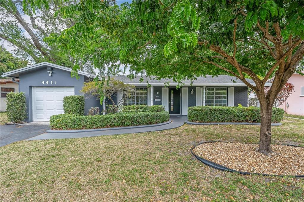 Great remodeled home in the highly desirable community of Hollywood Hills. Completely remodeled with designer finishes throughout, this spacious 3 bedroom 2 bathroom home is ready for its new owner! With high end Kitchen Aid appliances, custom cabinetry, eat-in peninsula, and top of the line finishes, this kitchen looks like its featured in a design magazine. Bathrooms are tastefully remodeled and perfectly appointed to give the feel of a spa in the comfort of your own home. Conveniently located just minutes from 95, and the Turnpike, Hard Rock casino and the airport this home is in the perfect location. A very short walk to places of worship. Beautiful home in one of the best neighborhoods in Broward! Make your appointment to see today, this home will be gone quickly!