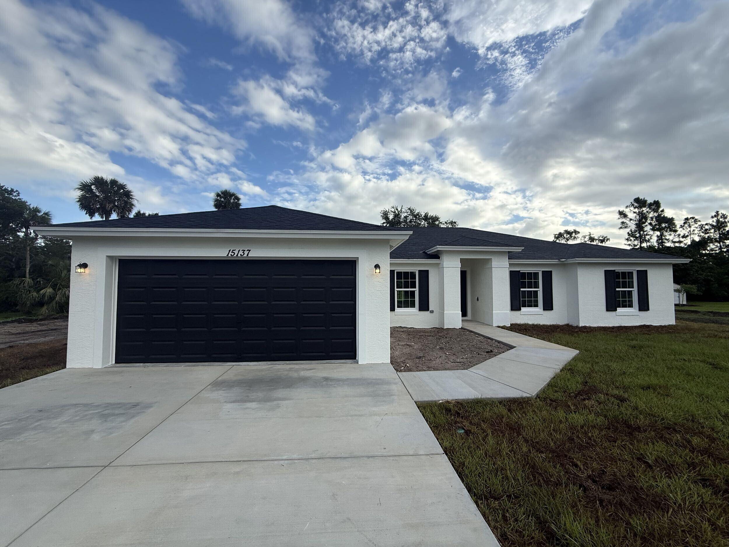 Brand NEW 4 bed 3 bath home! Wood Tiles, Granite counters.