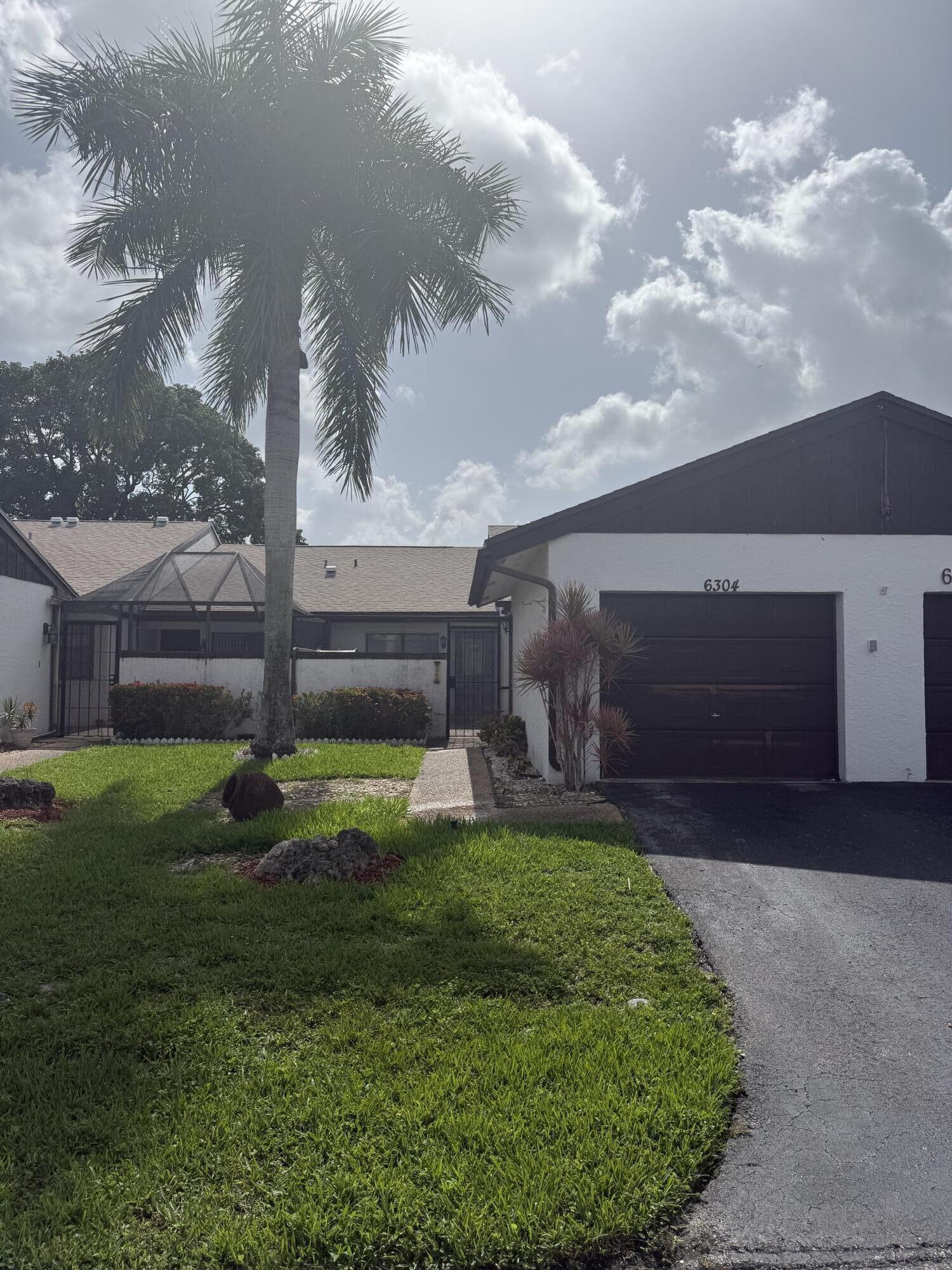 Welcome to this charming villa at Wedgewood Condominium in Tamarac, offering an excellent waterfront location with thoughtful design. This 1,060 square-foot residence features two bedrooms and two full bathrooms, providing comfortable accommodations in a single-story layout. The villa includes a one-car garage, offering convenient parking and storage. Situated in the well-established Wedgewood Condominium community, this waterfront property presents an appealing option for those seeking a compact, efficiently designed home with direct water access.