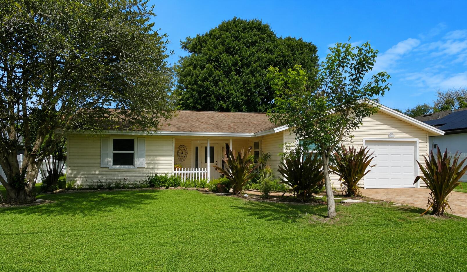 This well-maintained 3-bedroom, 2-bath home offers a bright, functional split floor plan with comfortable living spaces, indoor laundry room, and a screened lanai overlooking the backyard. The one-car garage provides additional storage and convenience. Located just minutes from the C-24 Canal boat ramp with ocean access, and close to the Florida Turnpike, US-1, shopping, dining, and parks, this home is a great opportunity for a primary residence, seasonal getaway, or investment property.